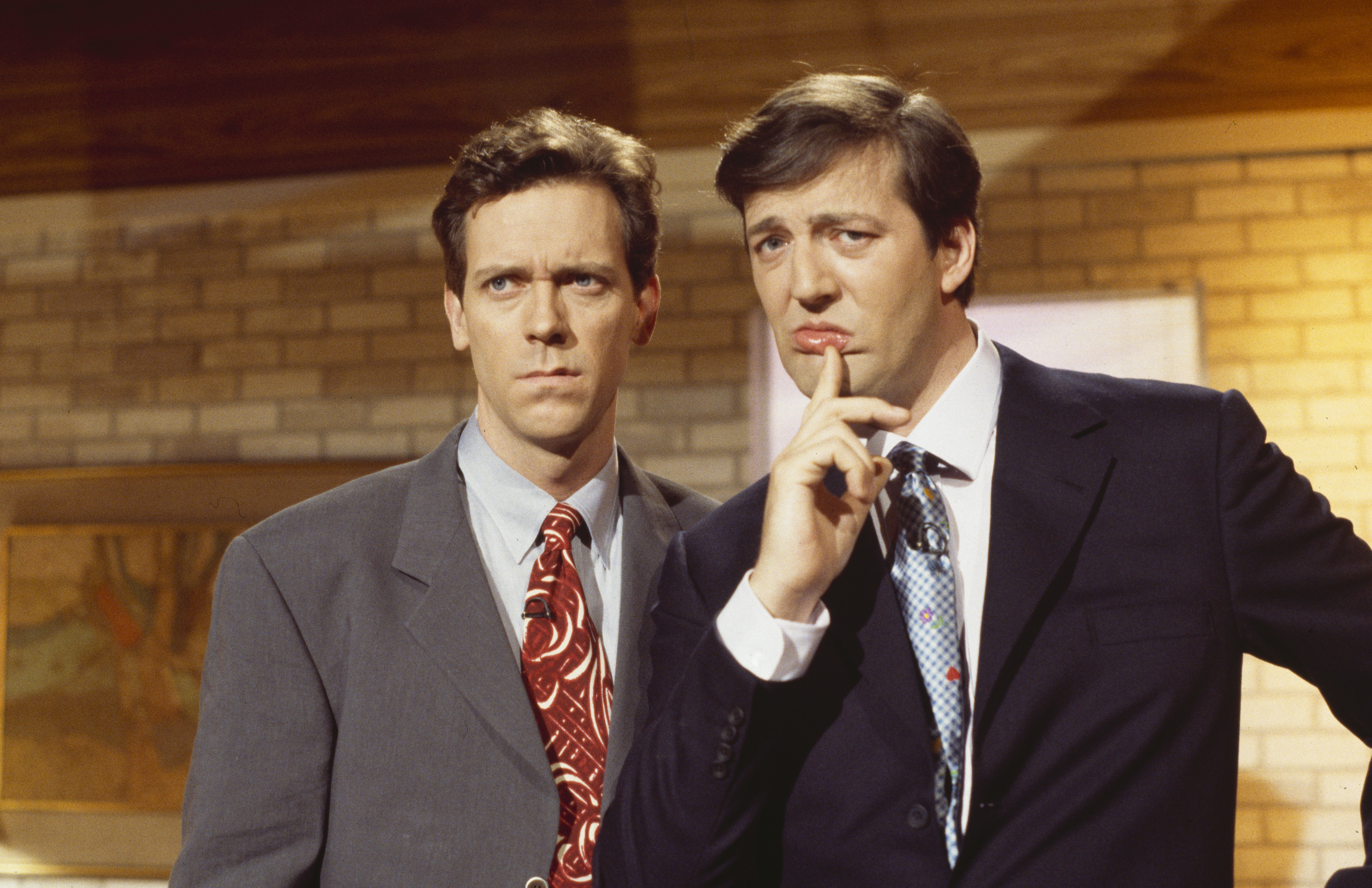 Hugh Laurie and Stephen Fry in a sketch from the BBC television series "A Bit of Fry and Laurie" on March 29th 1994. | Source: Getty Images