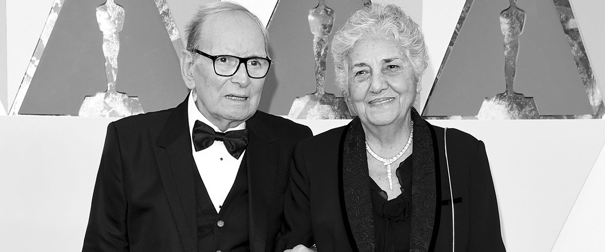 Ennio Morricone y su esposa en la 88a Anual de los Premios de la Academia en el Hollywood & Highland Center el 28 de febrero de 2016 en Hollywood. | Foto: Getty Images Ennio Morricone y su esposa en la 88a Anual de los Premios de la Academia en el Hollywood & Highland Center el 28 de febrero de 2016 en Hollywood. | Foto: Getty Images