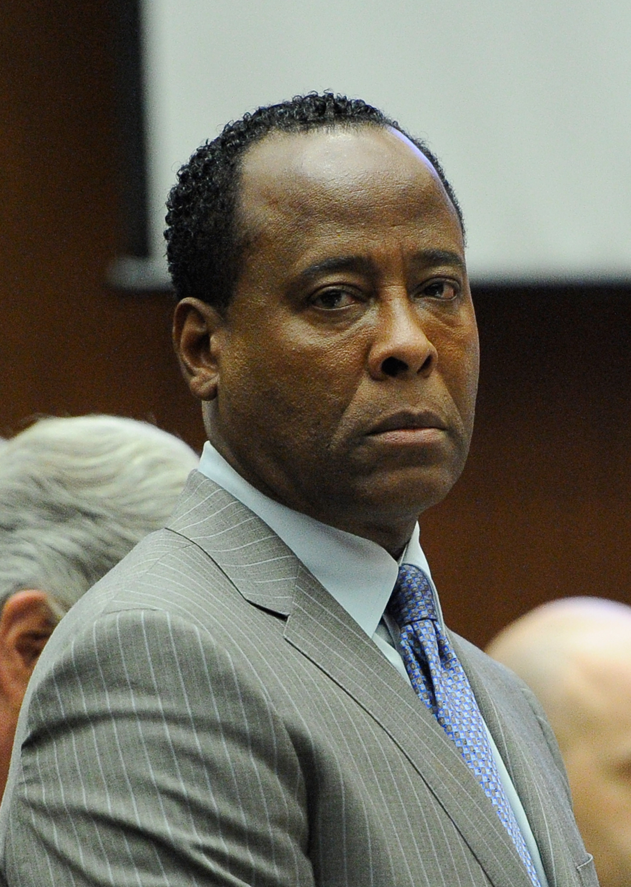 Dr. Conrad Murray waits to leave the courtroom for the day during the final stage of his defense in his involuntary manslaughter trial in the death of singer Michael Jackson at the Los Angeles Superior Court on November 1, 2011, in Los Angeles, California. | Source: Getty Images