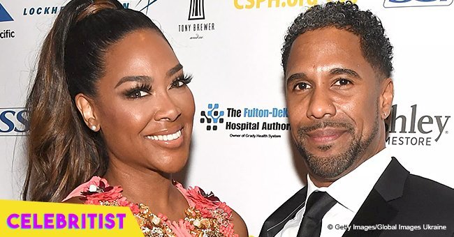 Kenya Moore shines in regal gold gown during her fairytale-themed baby shower