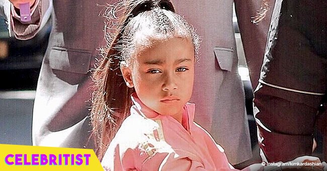 North West and her cousin give each other some serious side eye in recent photo