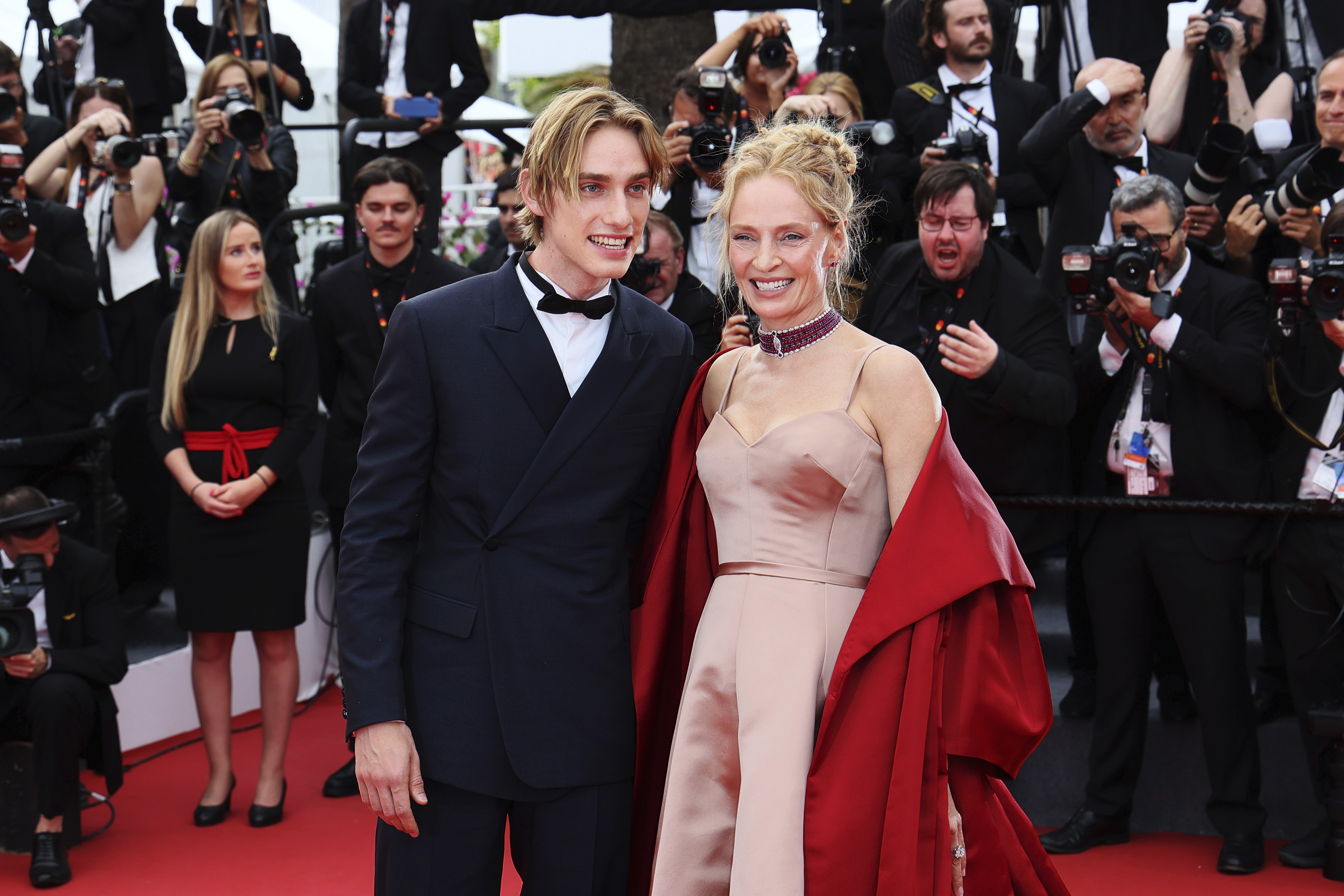 Levon Roan Thurman-Hawke and Uma Thurman at the "Jeanne du Barry" screening and opening ceremony red carpet at the 76th annual Cannes Film Festival on May 16, 2023, in Cannes, France | Source: Getty Images