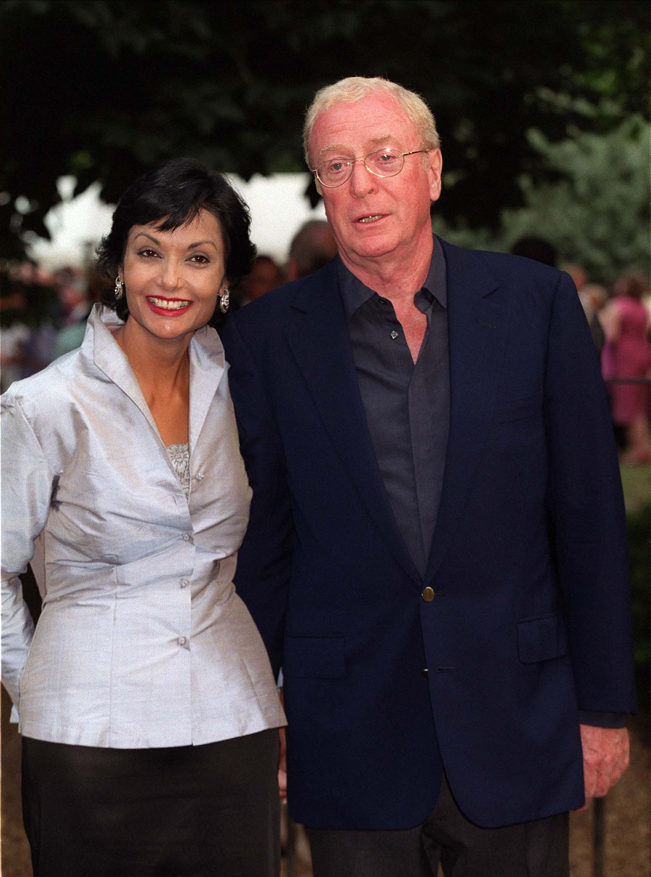 Michael Caine and Shakira Caine at a summer party on July 4, 2001 in Chelsea, London. | Source: Getty Images