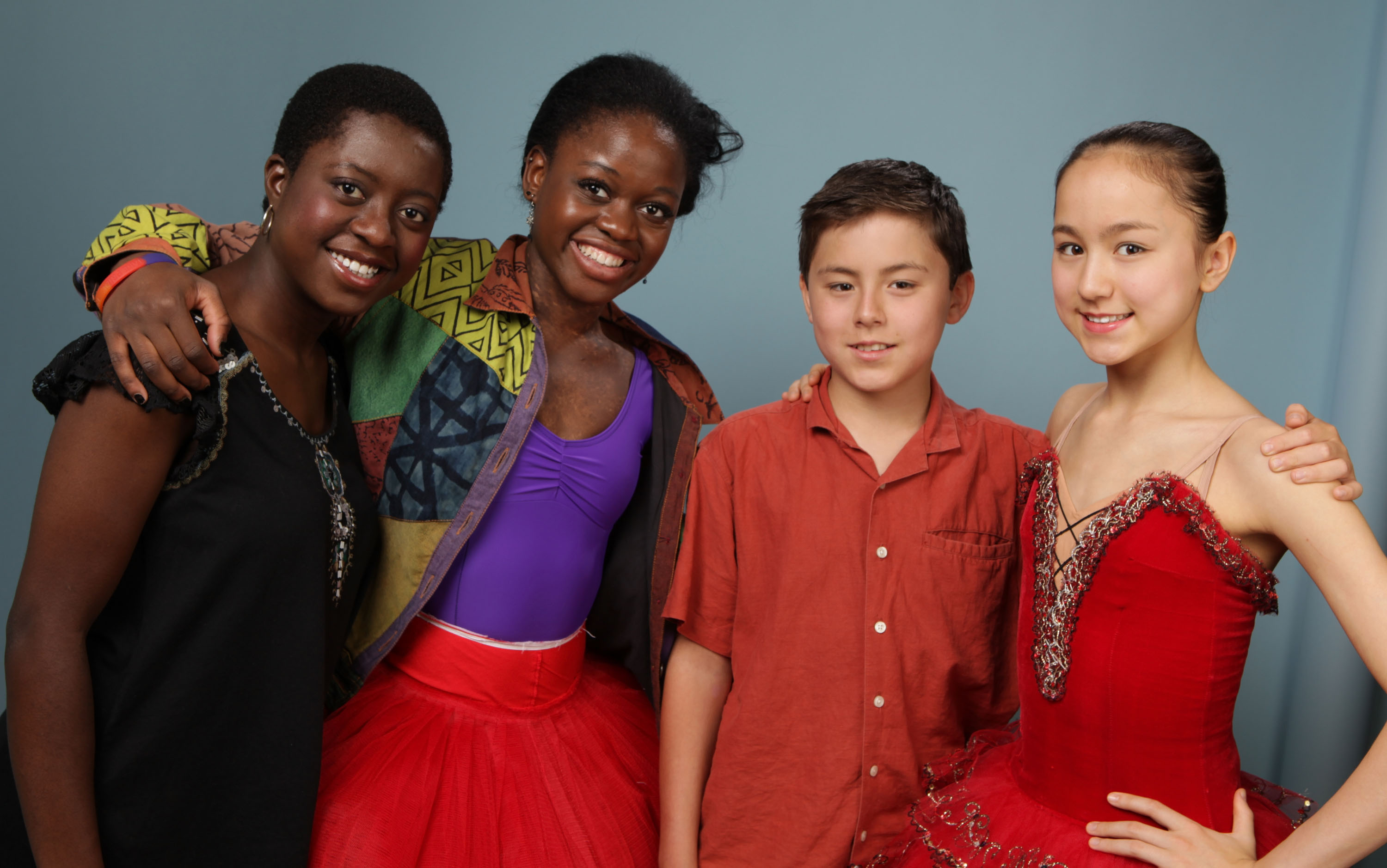 Mia DePrince, Michaela DePrince, Jules Jarvis Fogarty, and Miko Fogarty of "First Position" pose during the 2011 Toronto Film Festival in Toronto, Canada, on September 11, 2011 | Source: Getty Images