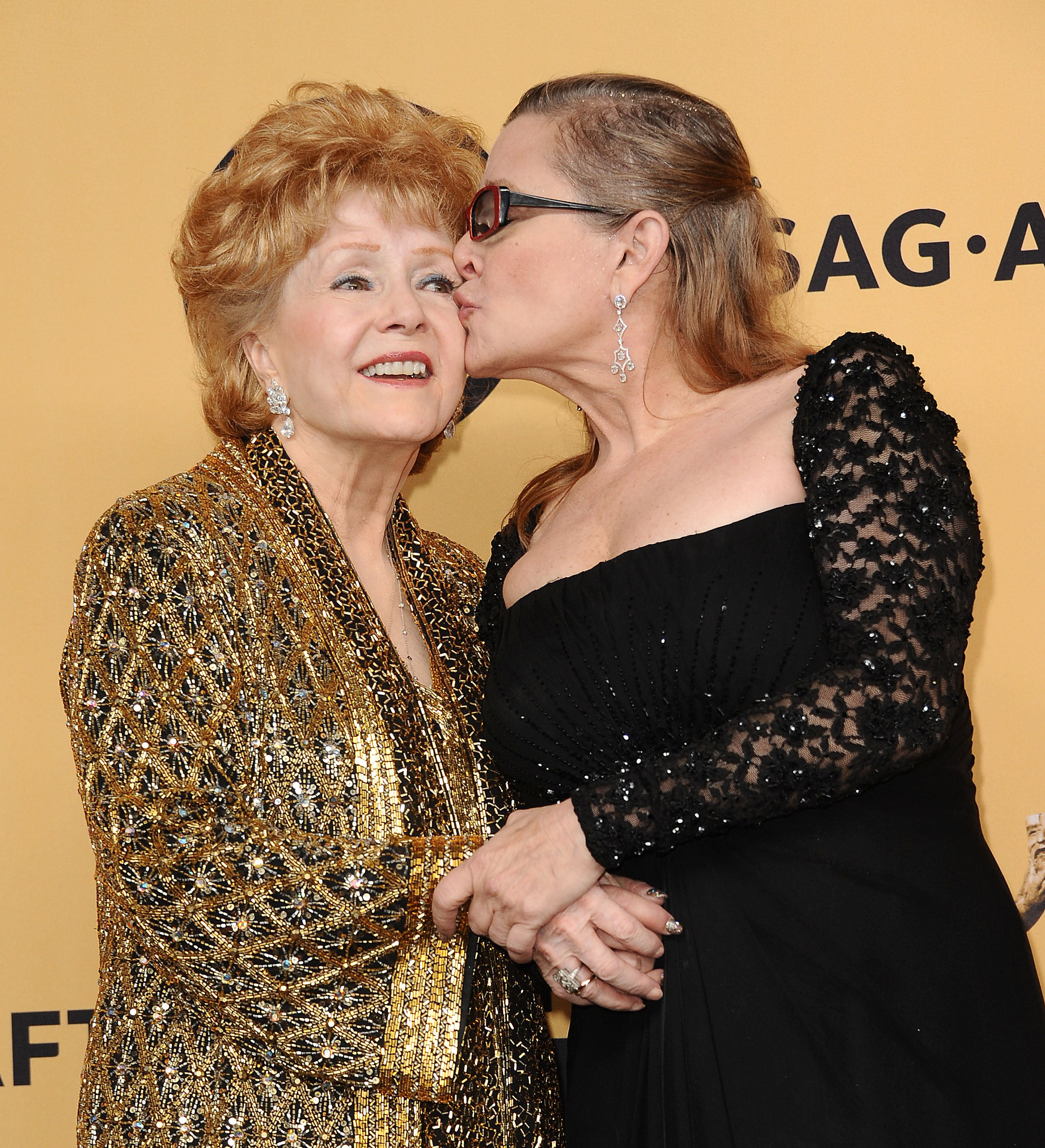 Debbie Reynolds and Carrie Fisher on January 25, 2015 in Los Angeles, California | Source: Getty Images