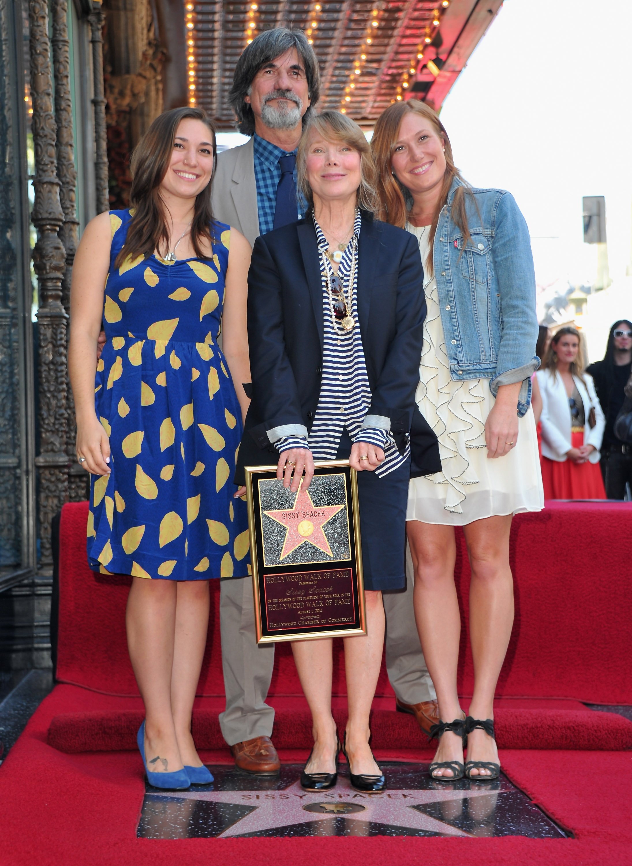 Madison Fisk, production designer Jack Fisk, actress Sissy Spacek and actress Schuyler Fisk attend the ceremony Honoring Sissy Spacek with the 2,443rd star on the Hollywood Walk of Fame in front of the El Capitan Theatre on August 1, 2011, in Hollywood, California. | Source: Getty Images.