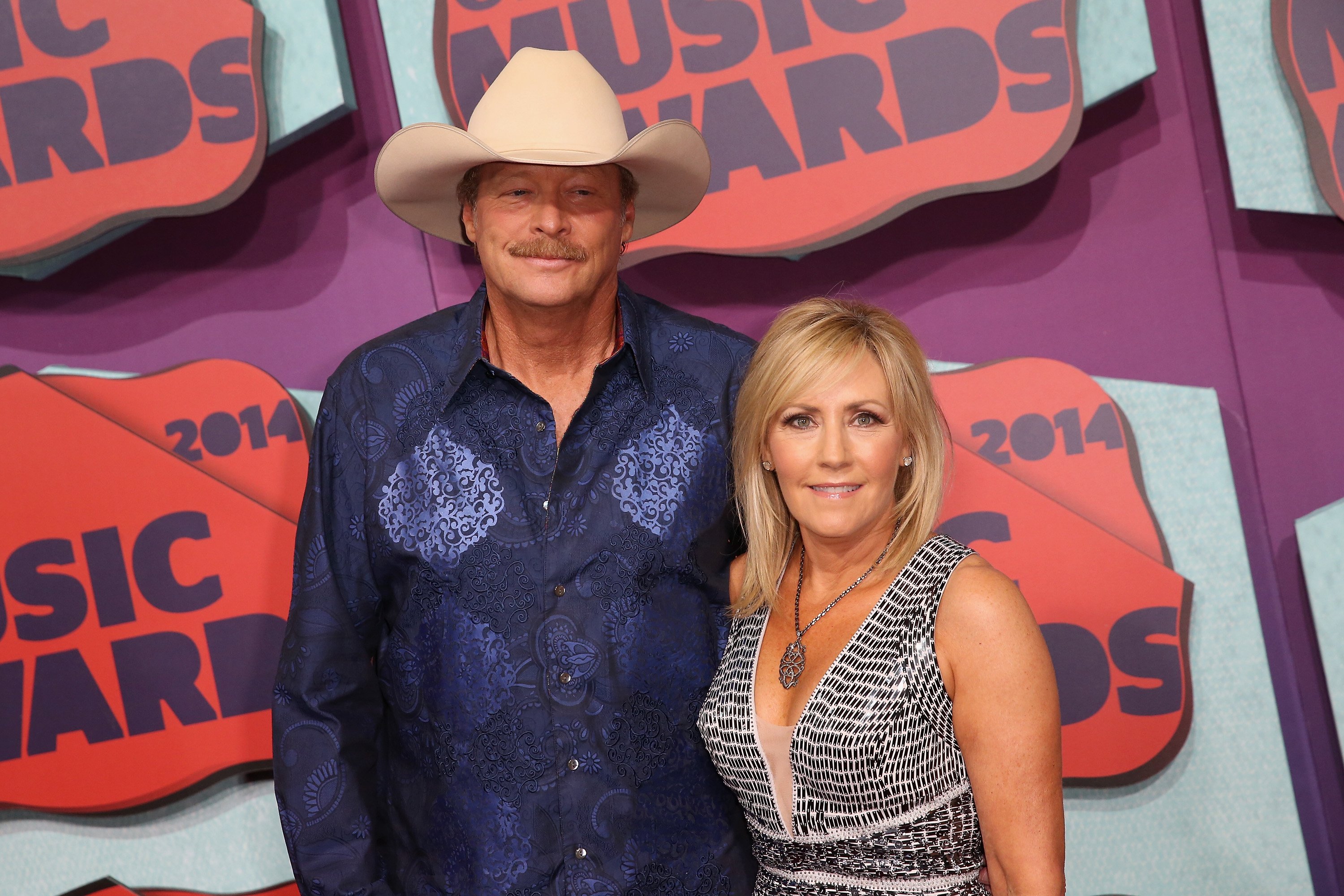 Singer-songwriter Alan Jackson and his wife Denise Jackson attend the 2014 CMT Music awards at the Bridgestone Arena on June 4, 2014 in Nashville, Tennessee ┃Source: Getty Images