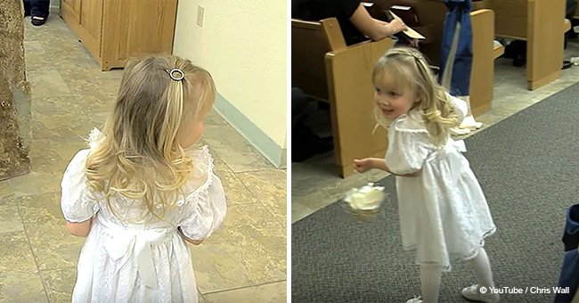 Nervous flower girl was too scared to walk down the aisle until groomsman stepped in