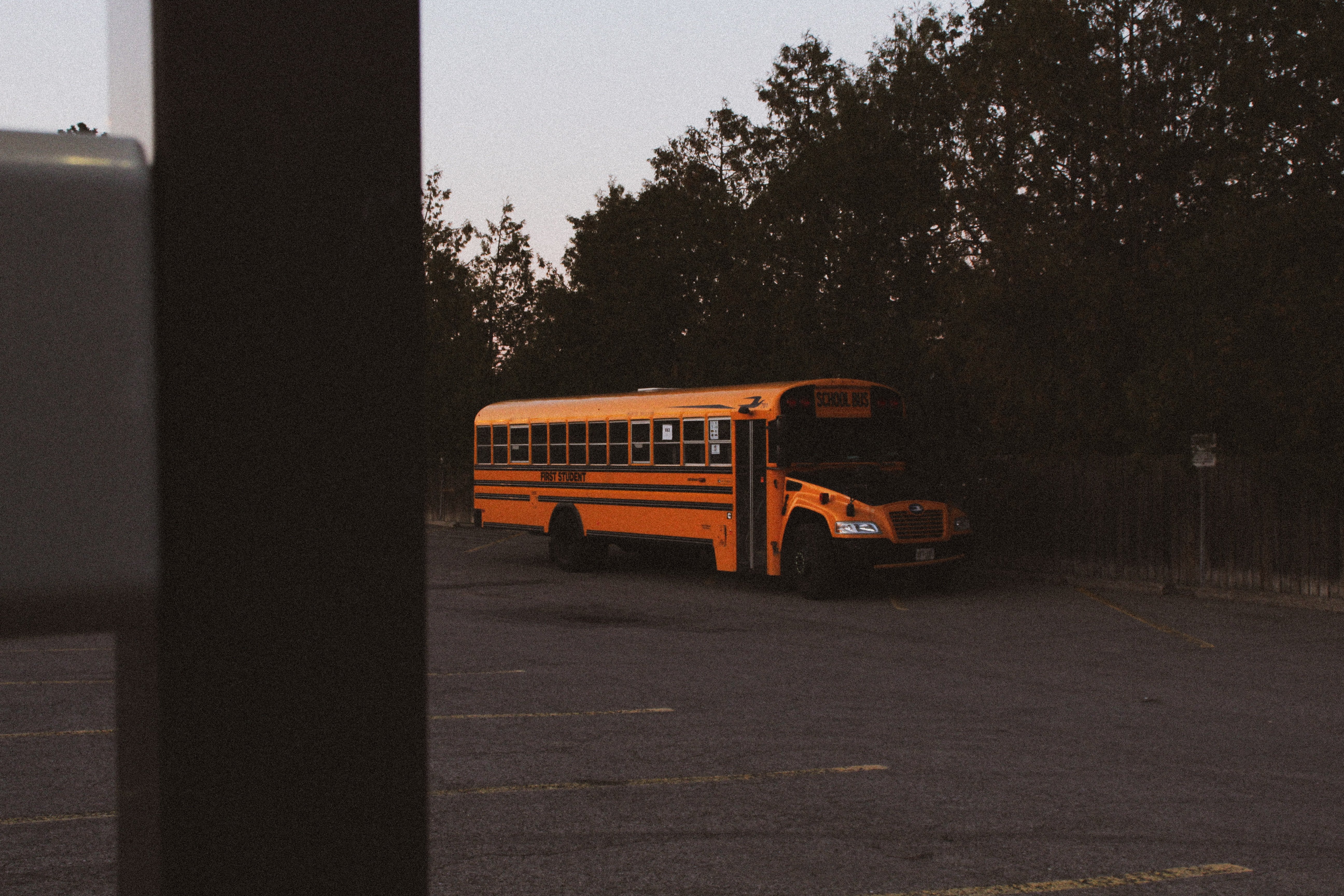 OP's mom saw a school bus pulling up outside the house earlier than usual. | Source: Unsplash 