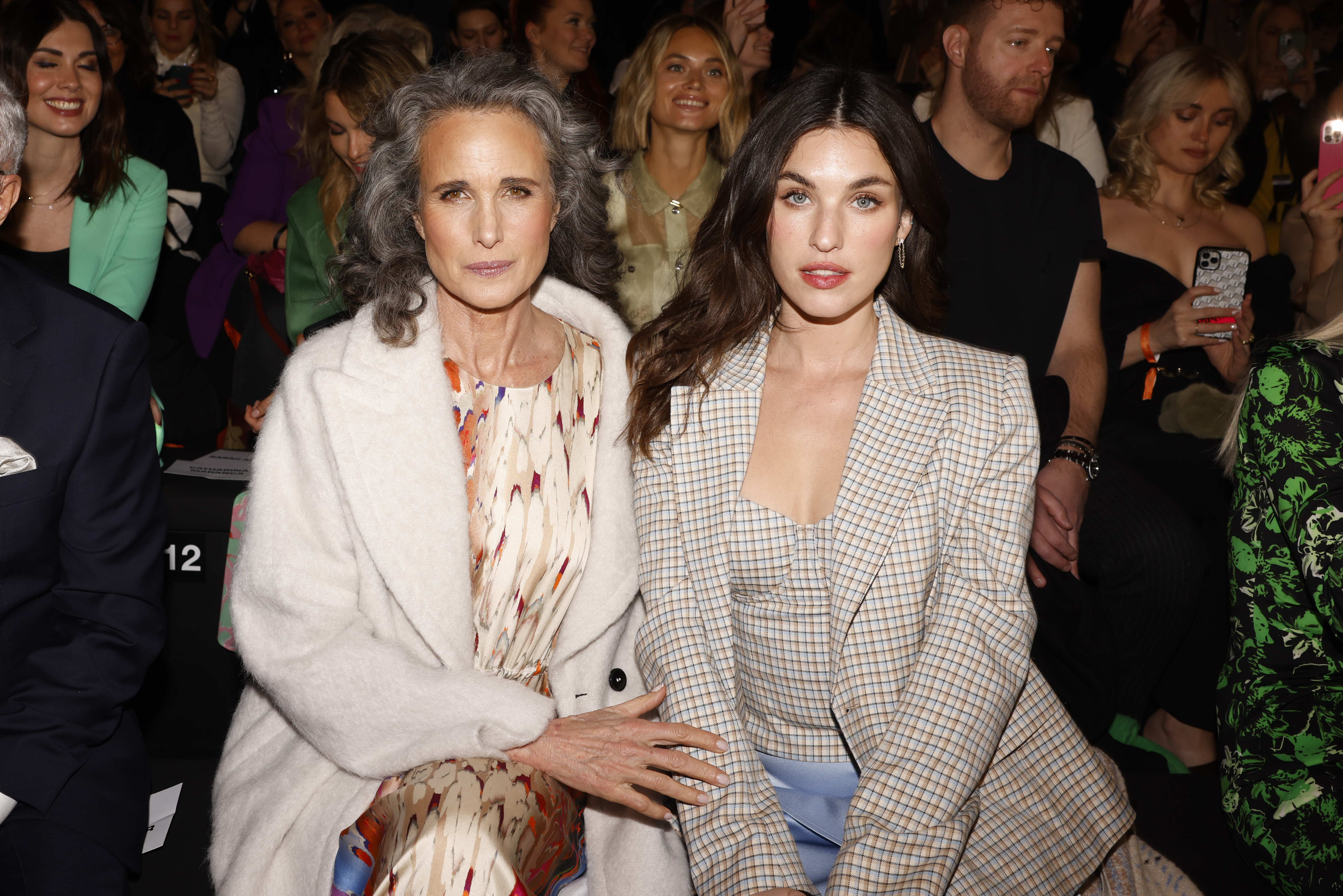 Andie MacDowell with daughter Rainey Qualley attend the Marc Cain Fashion Show Fall/Winter 2023 at Tempelhof Airport on January 18, 2023 in Berlin, Germany | Source: Getty Images