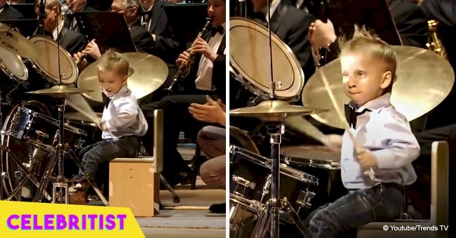 3-year-old drummer takes the stage and steals the show leading an orchestra