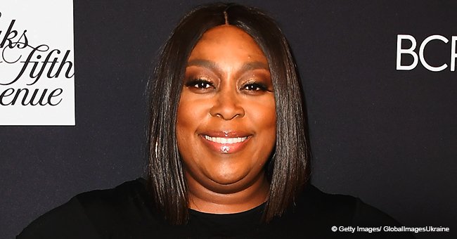 Loni Love shows off major weight loss in new pic as she flaunts her slimmer figure in sparkly dress