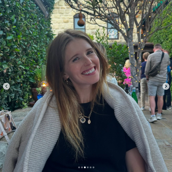 Katherine Schwarzenegger smiling for a photo, posted on December 13, 2024. | Source: Instagram/prattprattpratt