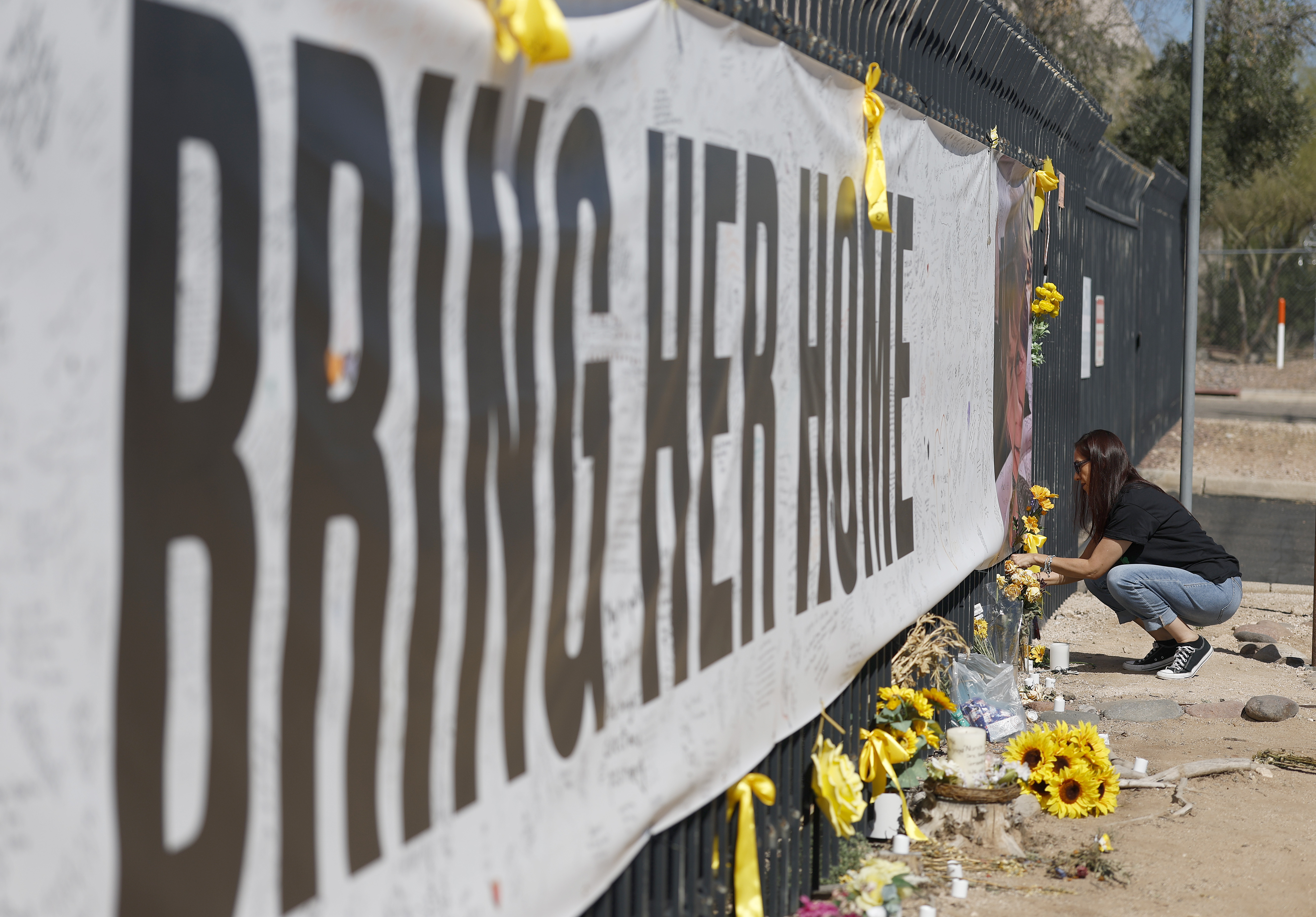 A display calling for Nancy Guthrie's safe return is seen in Tucson, Arizona, on March 3, 2026 | Source: Getty Images
