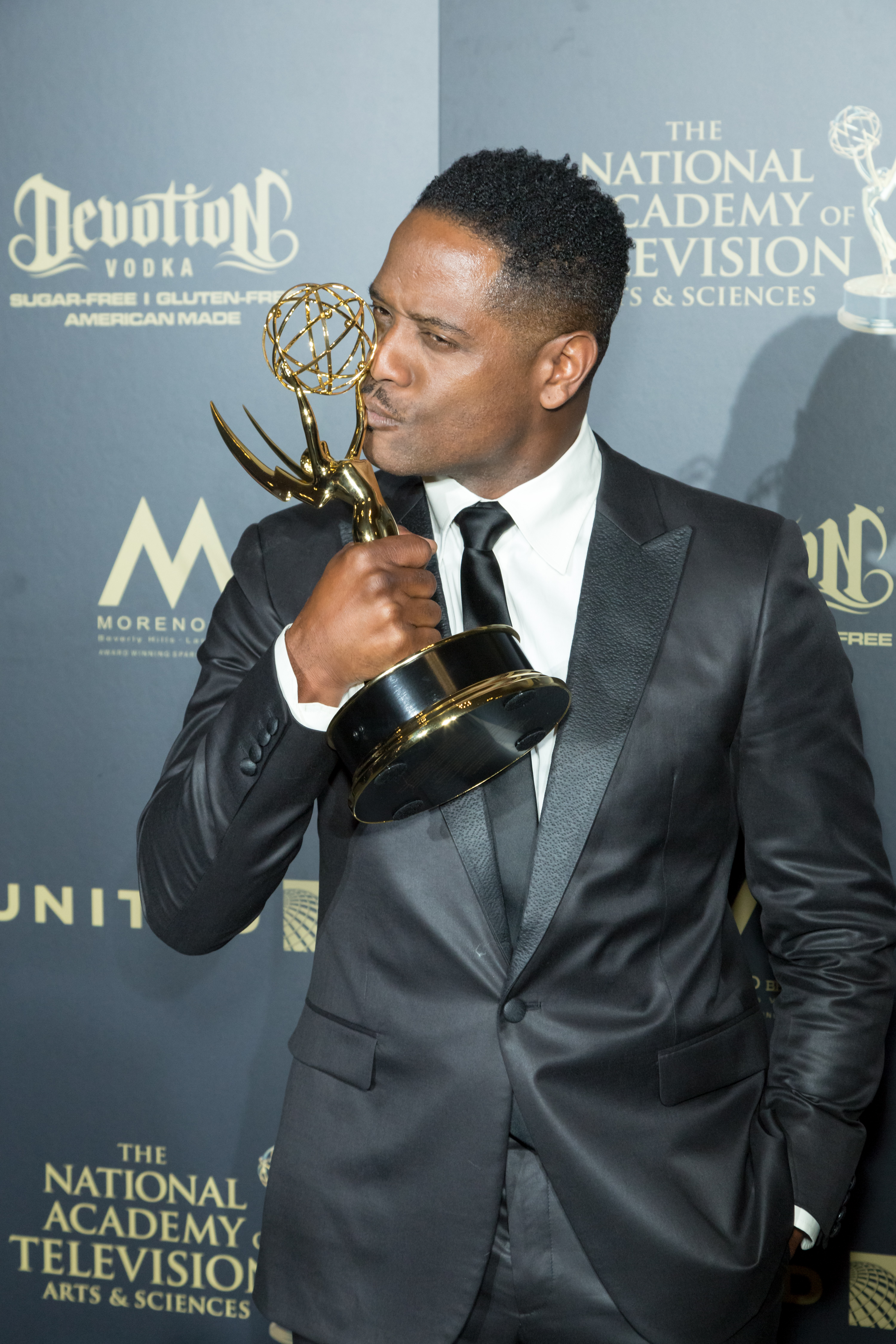 Blair Underwood, Executive Producer for 'Give', displays his Emmy Award at the 44th Annual Daytime Creative Arts Emmy Awards at Pasadena Civic Auditorium on April 28, 2017, in Pasadena, California | Source: Getty Images