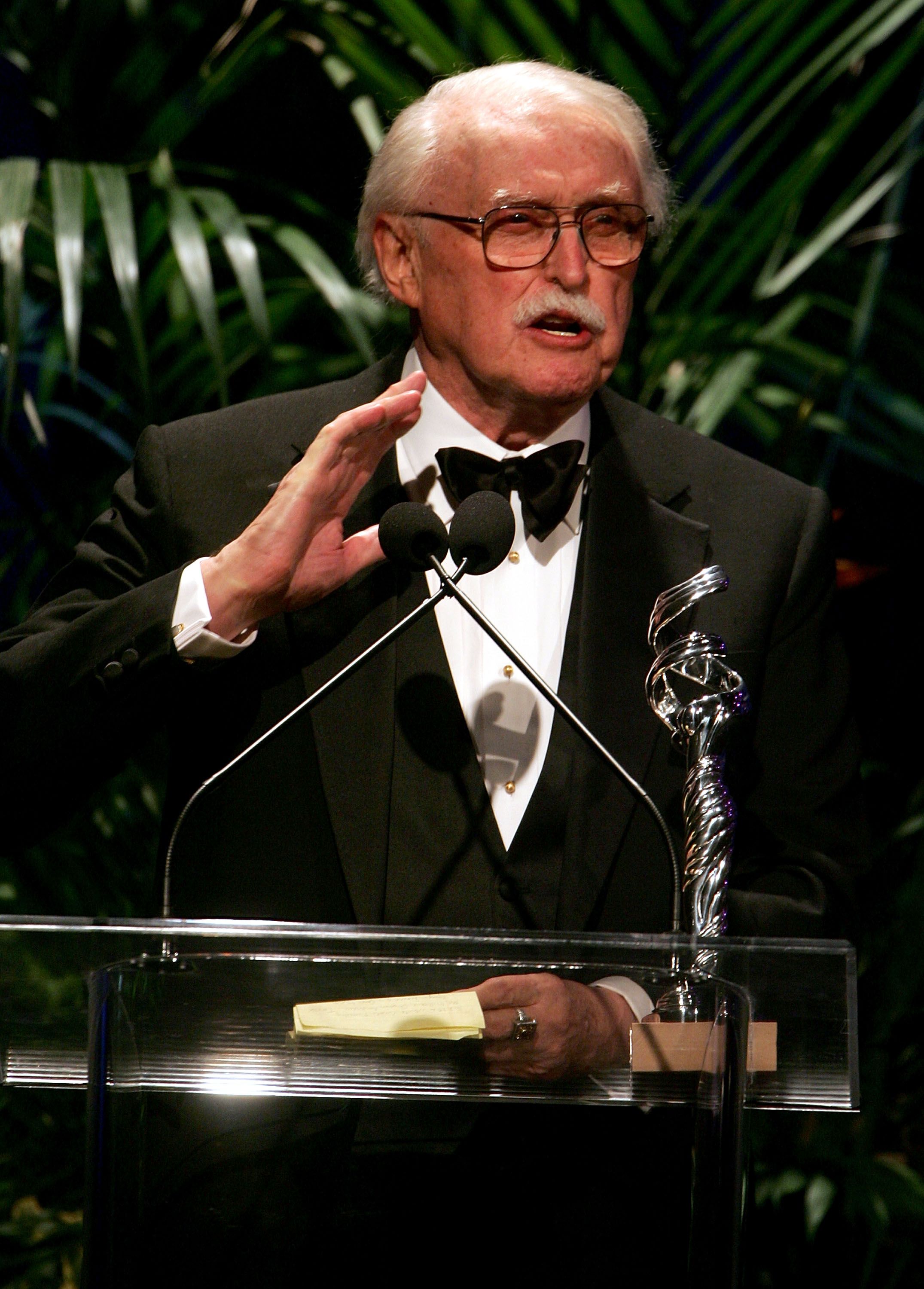 Robert Fletcher accepts the "Career Achievment for Television" onstage at the 7th Annual Costume Designers Guild Awards on February 19, 2005 | Getty Images 