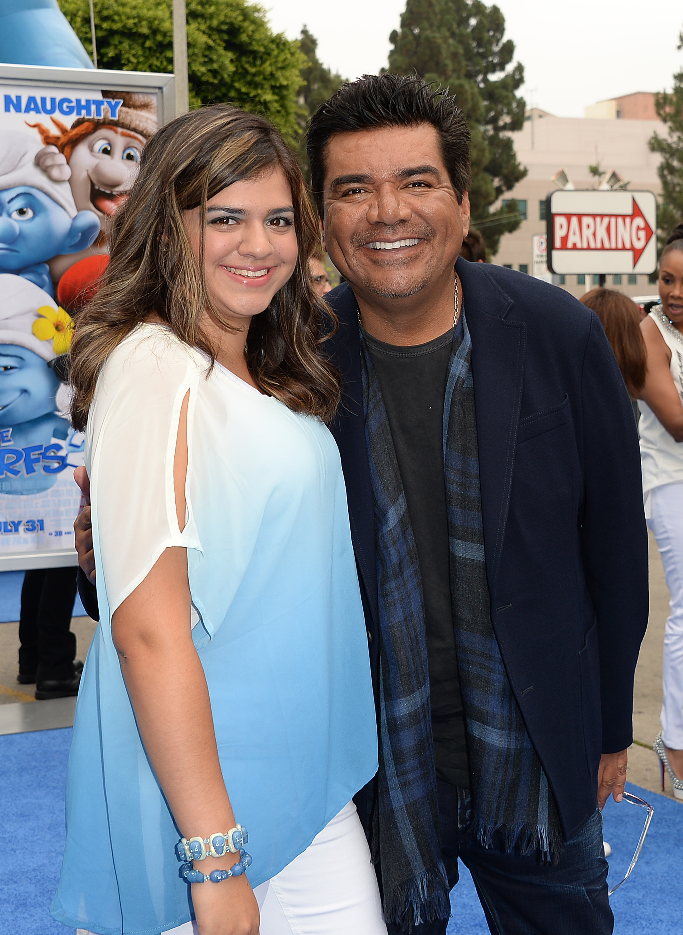 Mayan and George Lopez attend the premiere of "Smurfs 2," 2013 | Source: Getty Images