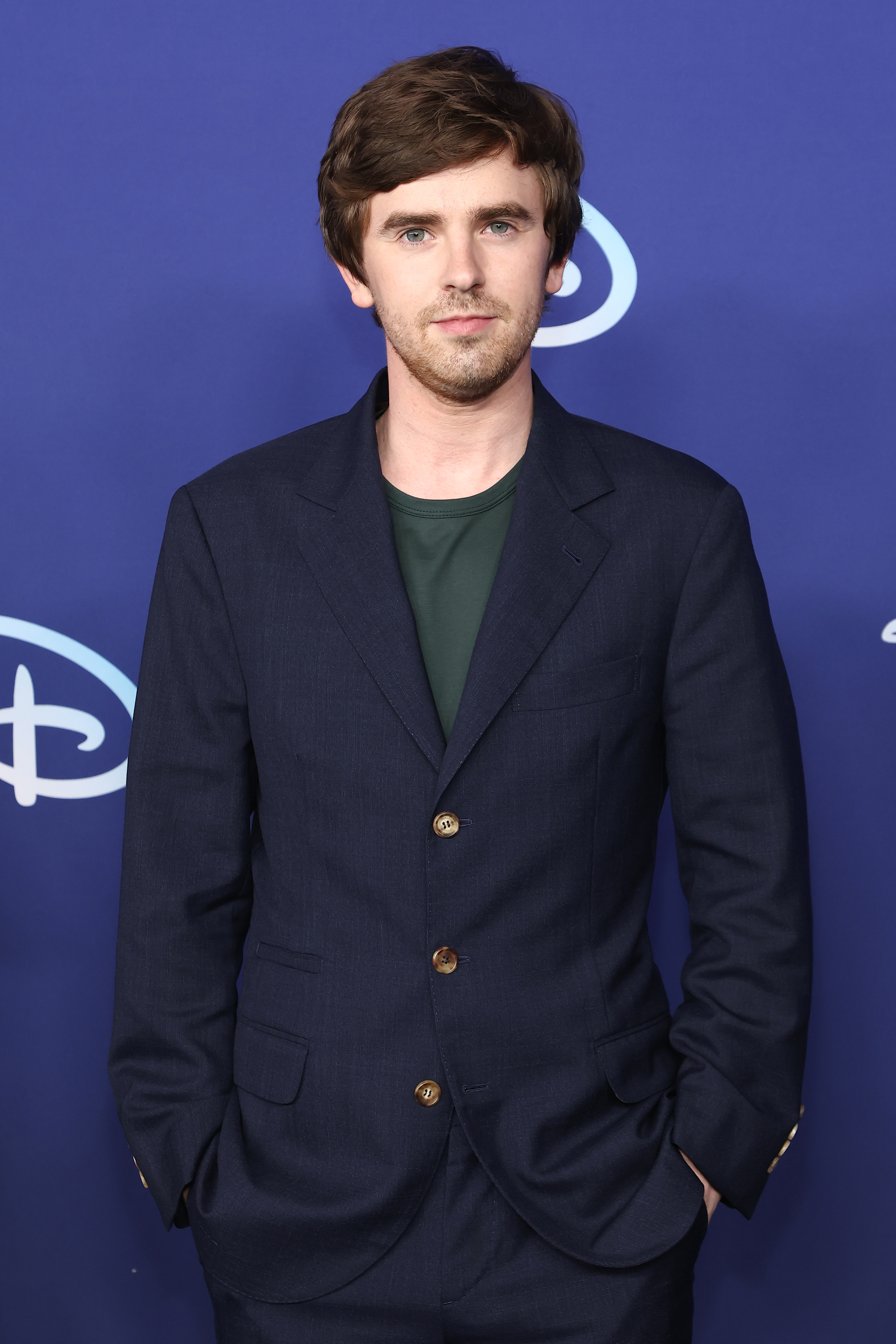 Freddie Highmore attends the ABC Disney Upfront at Basketball City - Pier 36 - South Street in New York City, on May 17, 2022. | Source: Getty Images