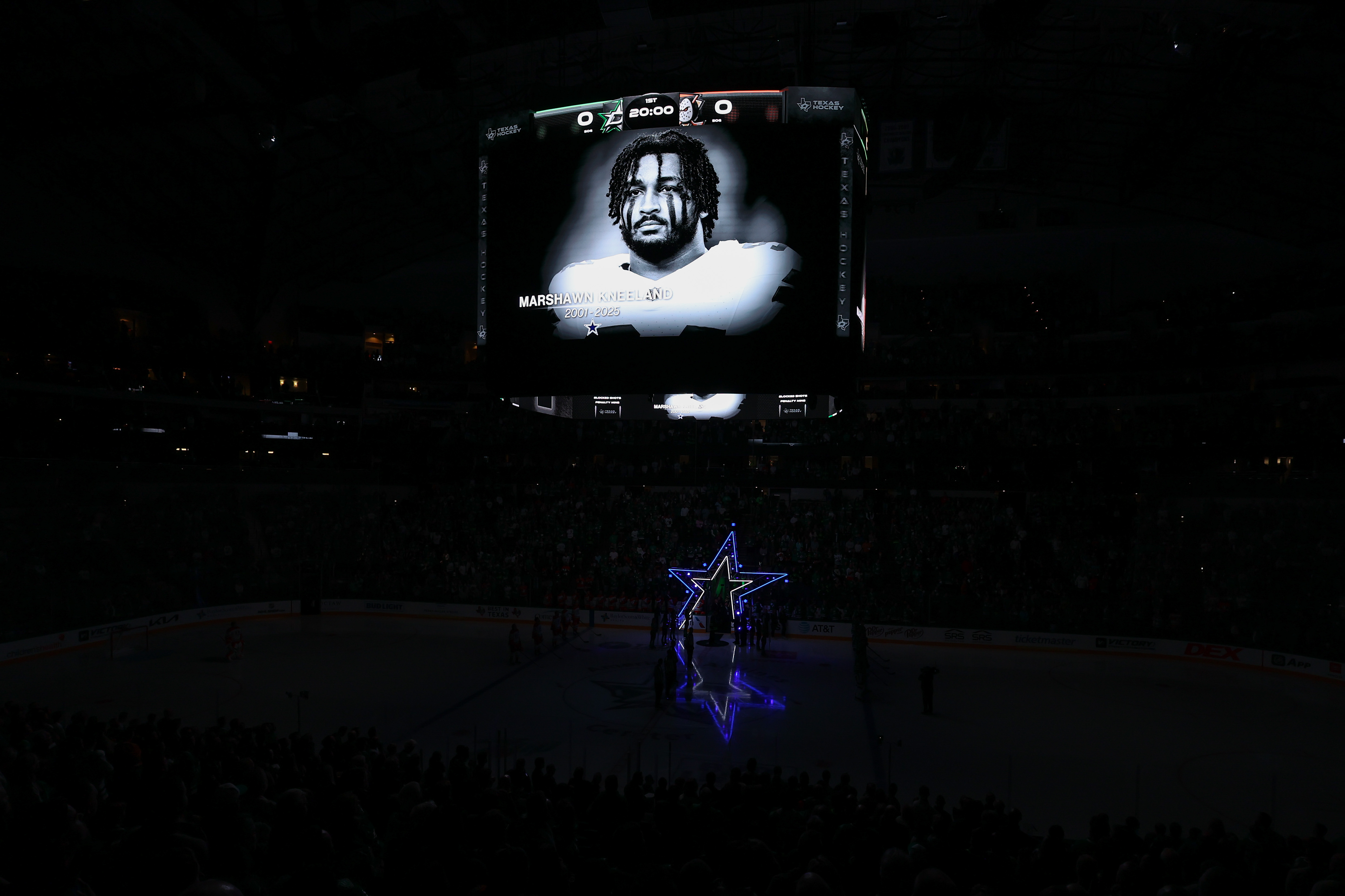 A tribute to Marshawn Kneeland is displayed on the arena screen before the Dallas Stars vs. Anaheim Ducks game in Texas on November 6, 2025 | Source: Getty Images