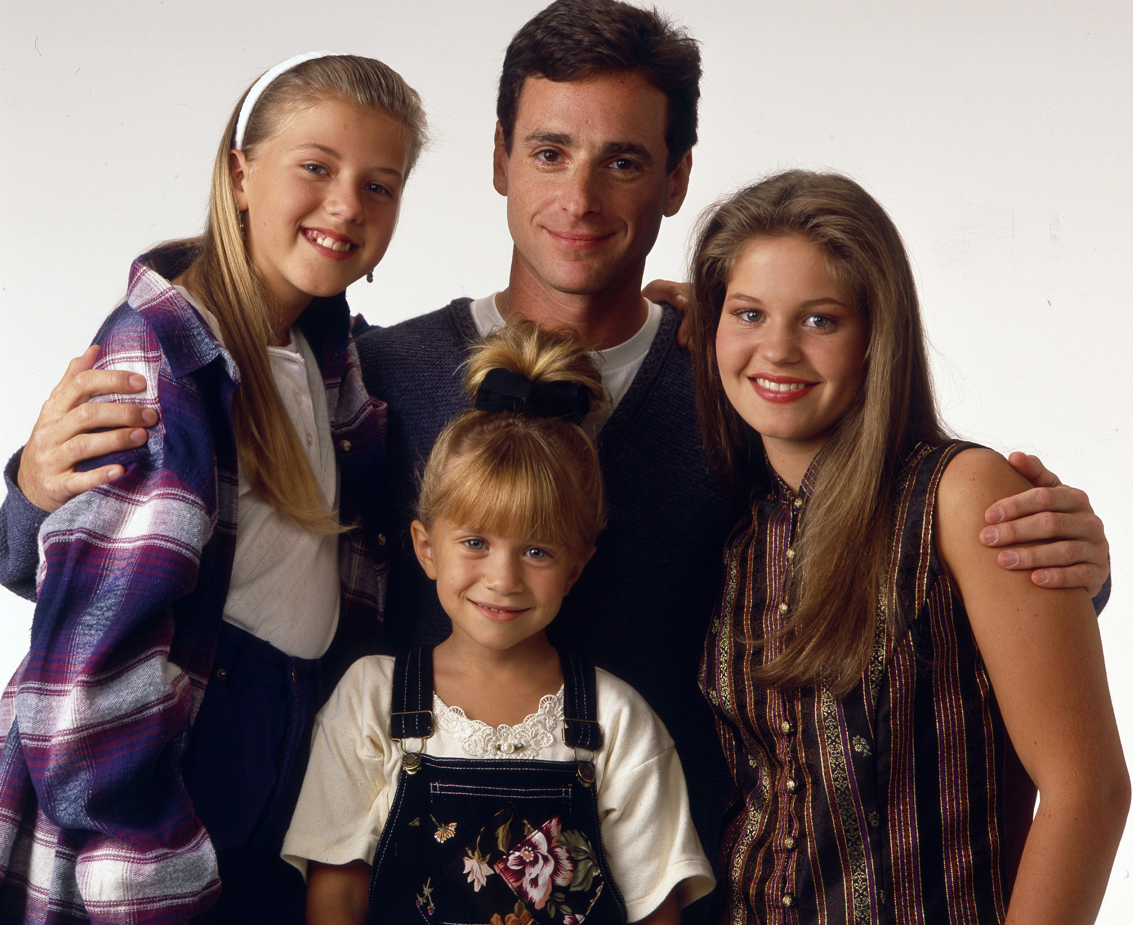 The girl with part of the "Full House" cast in 1993 | Source: Getty Images