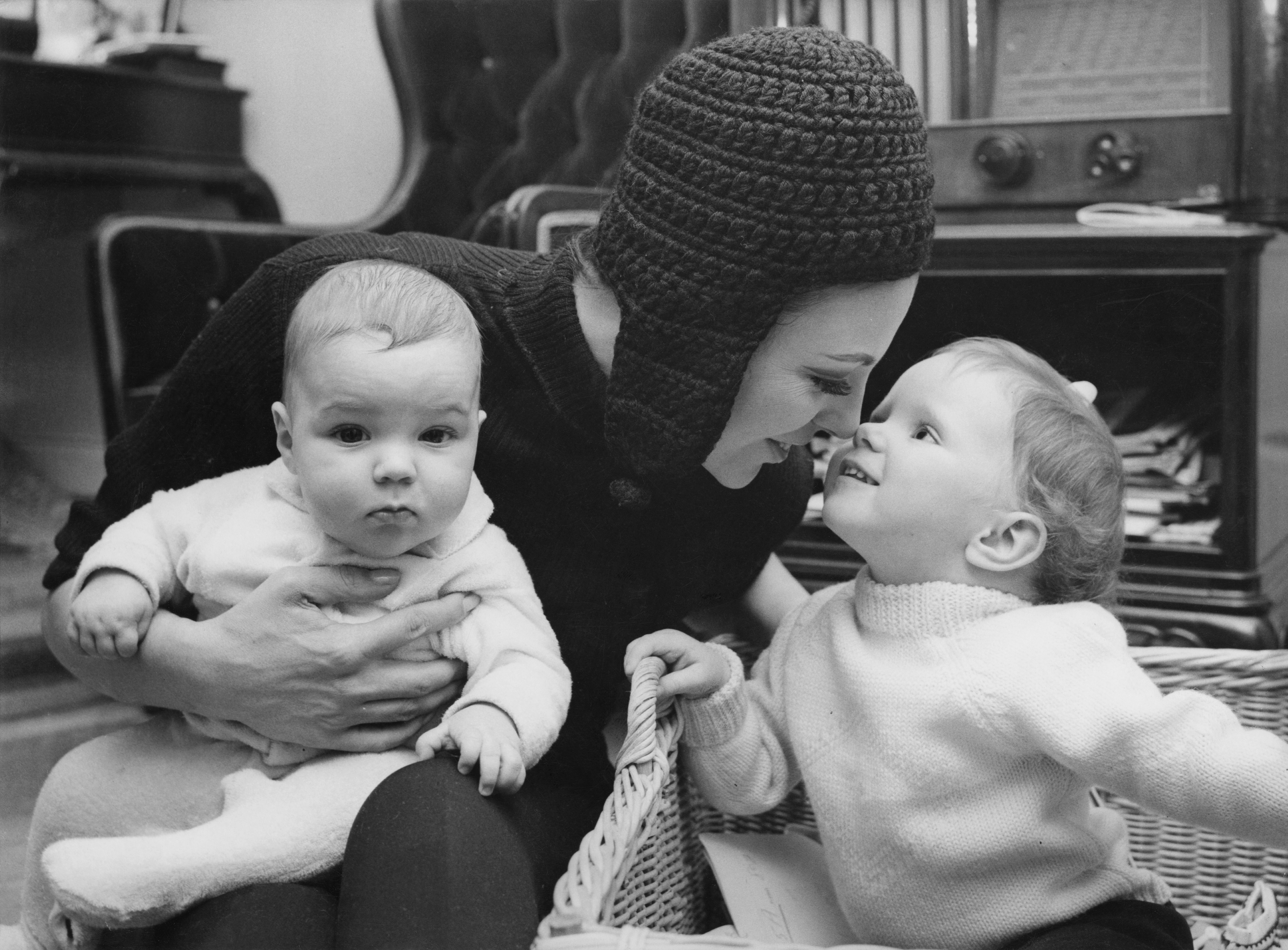 Joan Collins with her daughter Tara Newley (right) and son Alexander Newley, (known as Sacha) in St Moritz, Switzerland, 1966 | Source: Getty Images