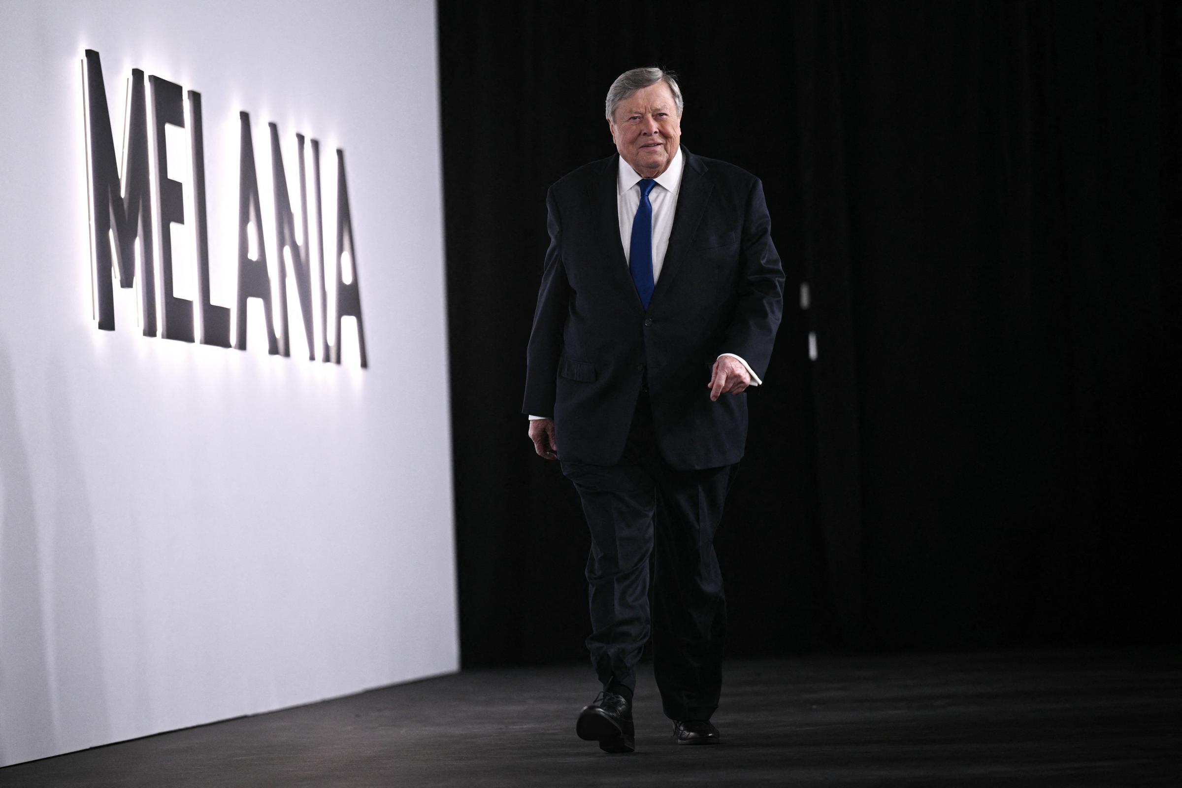 Standing beside the giant Melania display, Viktor Knavs made a rare appearance at the documentary's world premiere in Washington, D.C. The event offered another glimpse of Melania Trump's father at one of the family's biggest public milestones. | Source: Getty Images