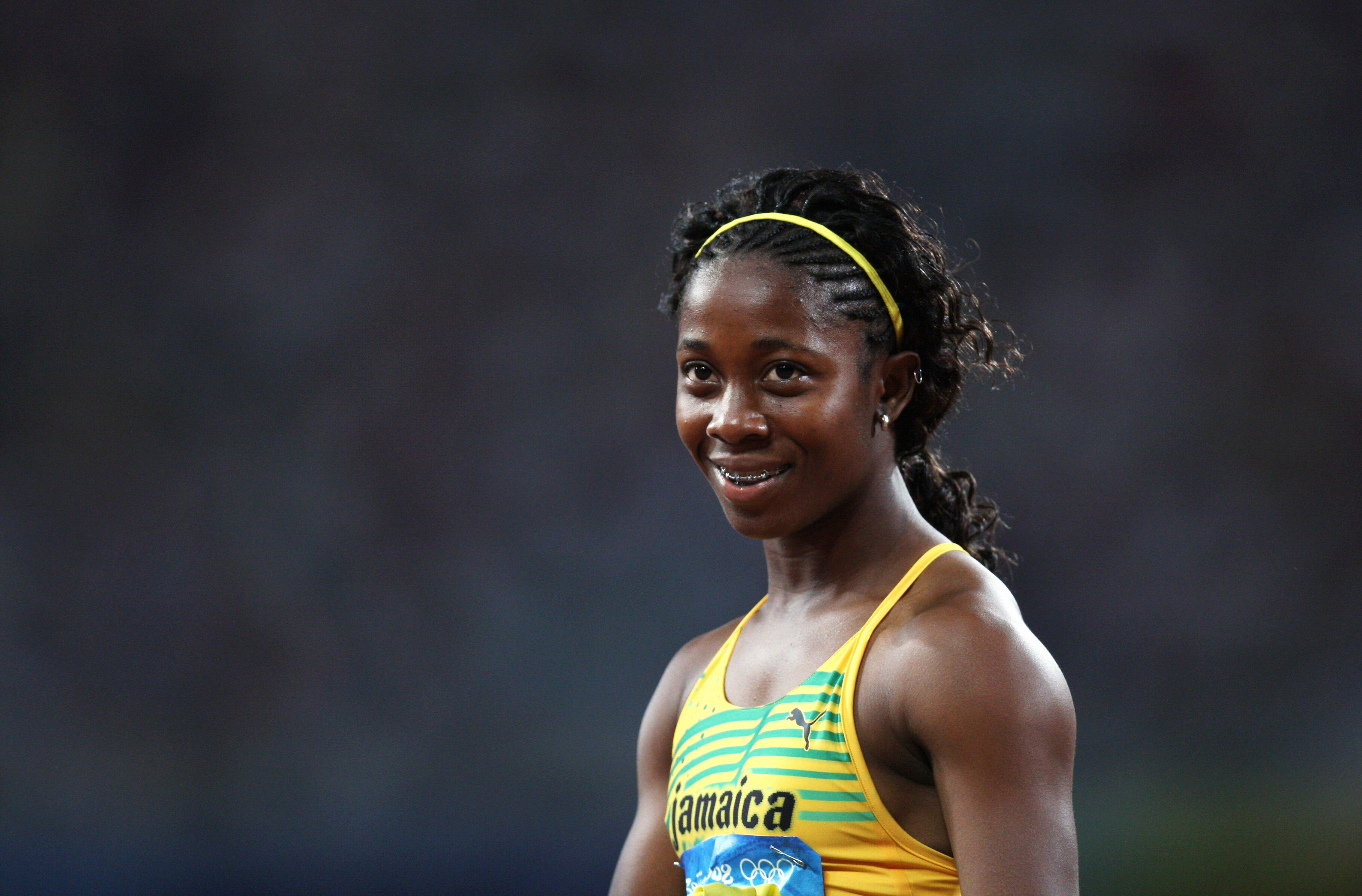 Jamaica's Shelly-Anna Fraser celebrates winning the Women's 100m Final during the 2008 Beijing Olympic Games on August 17, 2008, in Beijing, China. | Source: Getty Images