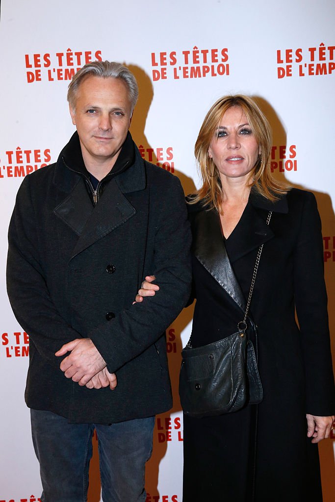 L'actrice Mathilde Seigner avec son compagnon Mathieu Petit assistent à la première parisienne de "Les Têtes de l''Emploi" au Cinéma Gaumont Opéra Capucines le 14 novembre 2016 à Paris, France. | Photo : Getty Images