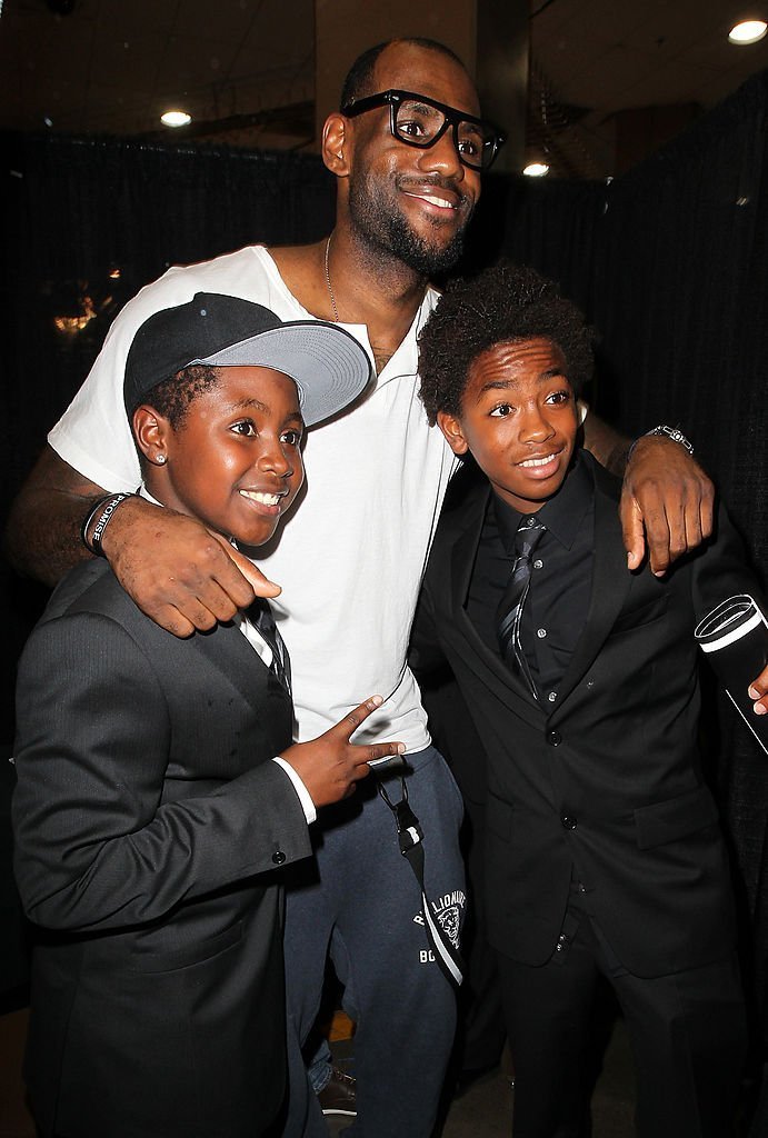  LeBron James (center) with Anderson Silva's children during UFC 148 inside MGM Grand Garden Arena | Getty Images