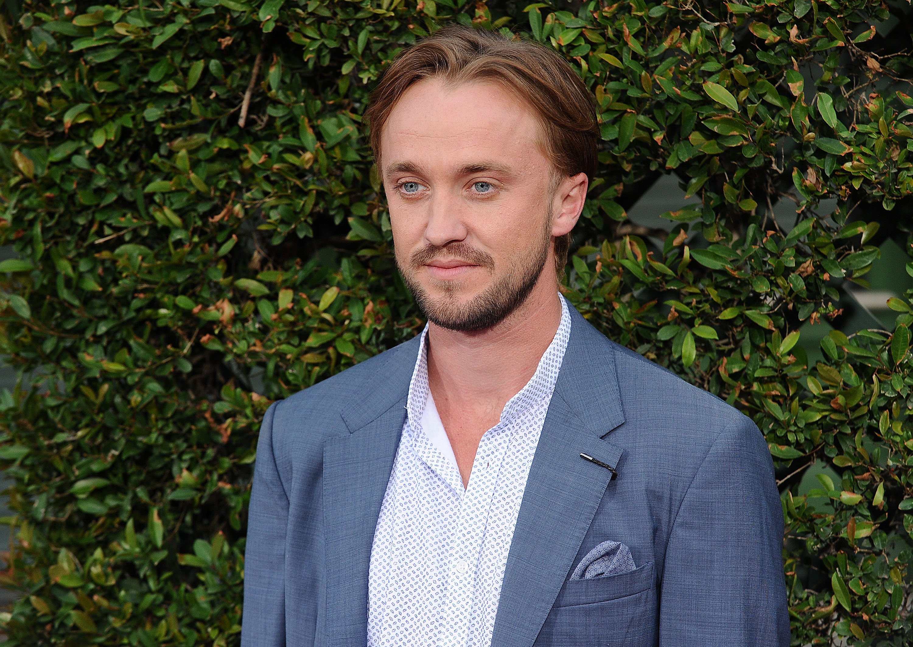 Tom Felton attends the opening of "The Wizarding World of Harry Potter" at Universal Studios Hollywood on April 5, 2016 in Universal City, California | Photo: Getty Images