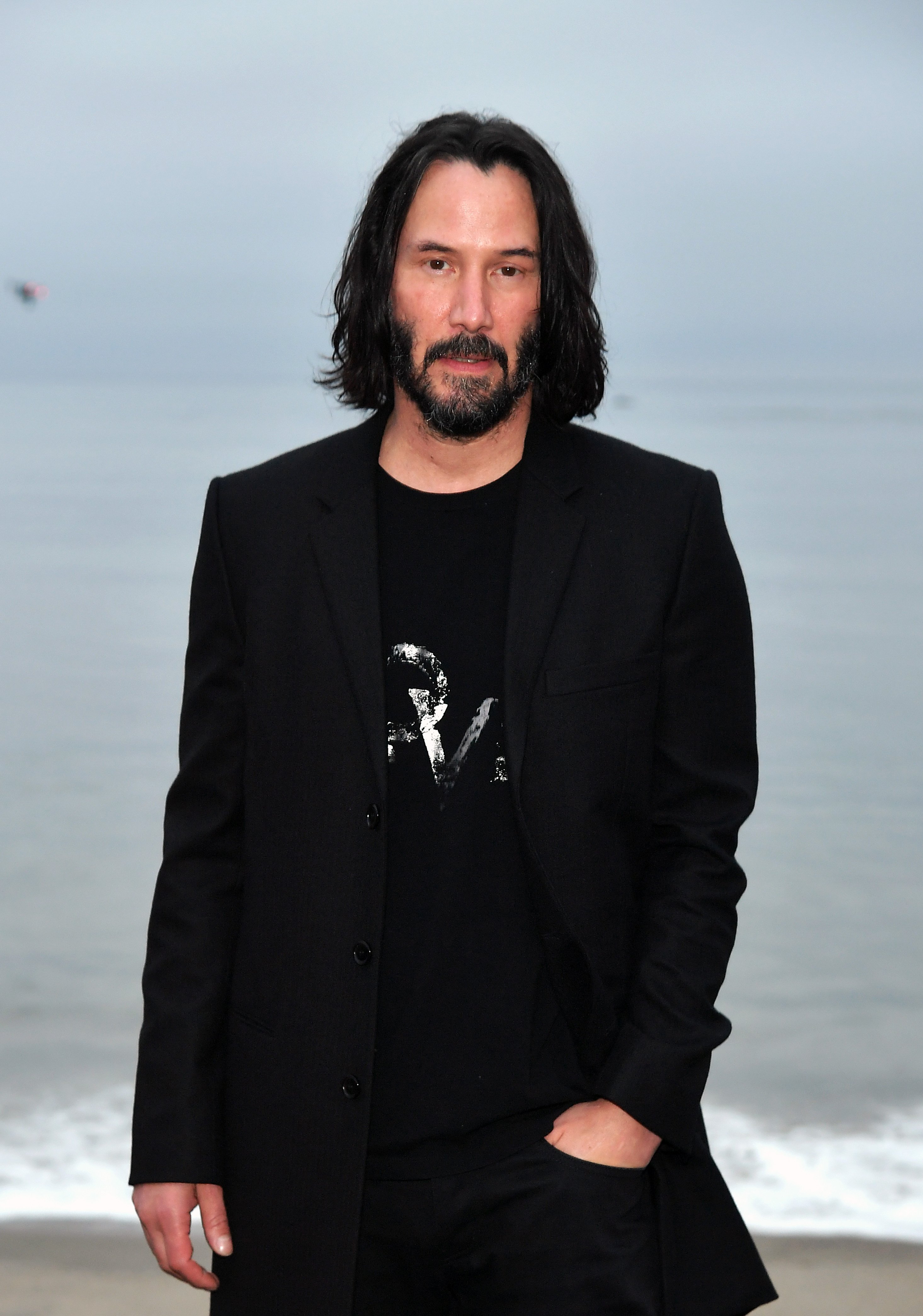 Keanu Reeves attends the Saint Laurent Mens Spring Summer 20 Show on June 6, 2019, in Paradise Cove Malibu, California. | Source: Getty Images