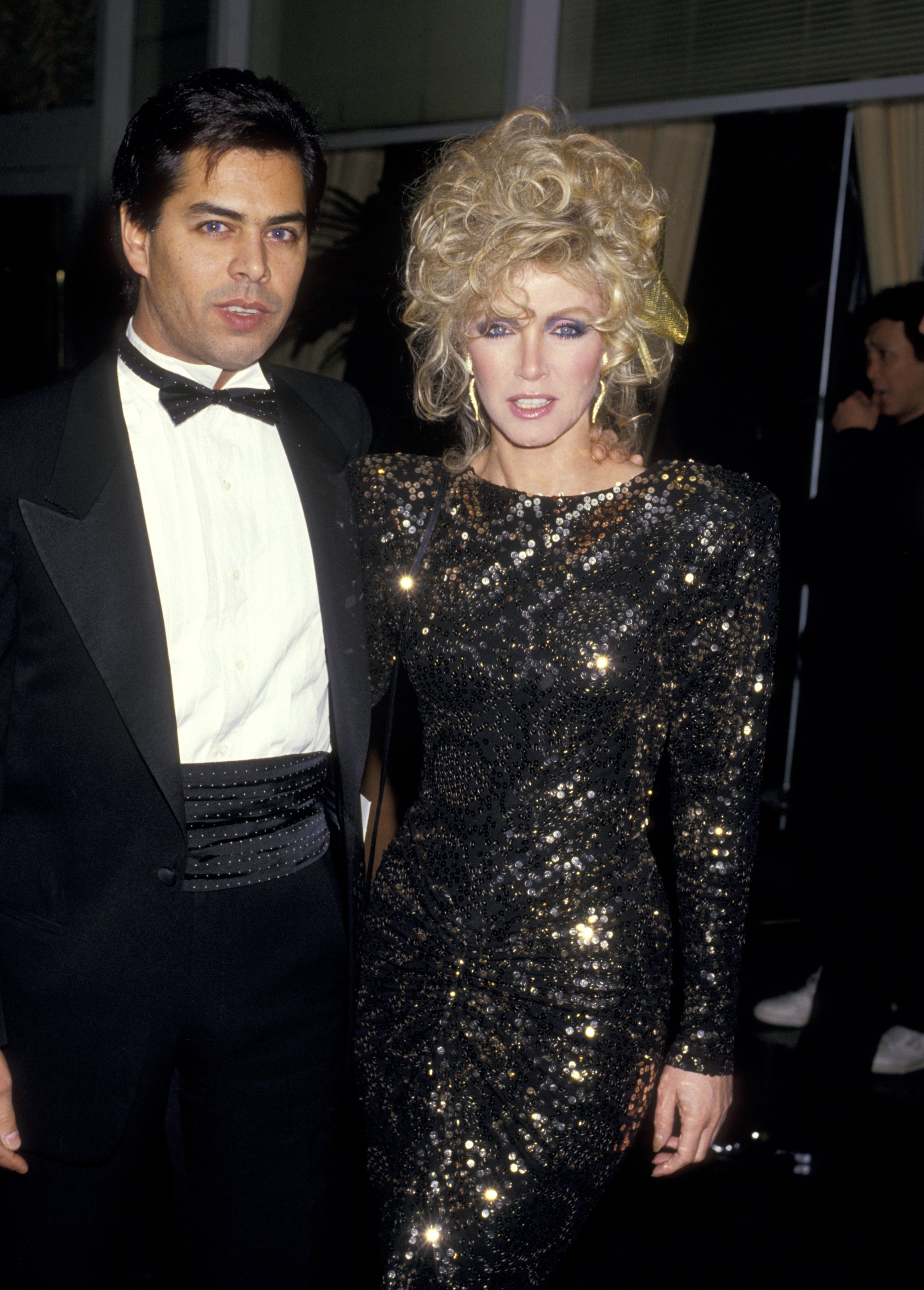 Donna Mills and Richard Holland during The 44th Annual Golden Globe Awards at Beverly Hilton Hotel in Beverly Hills, California. / Source: Getty Images