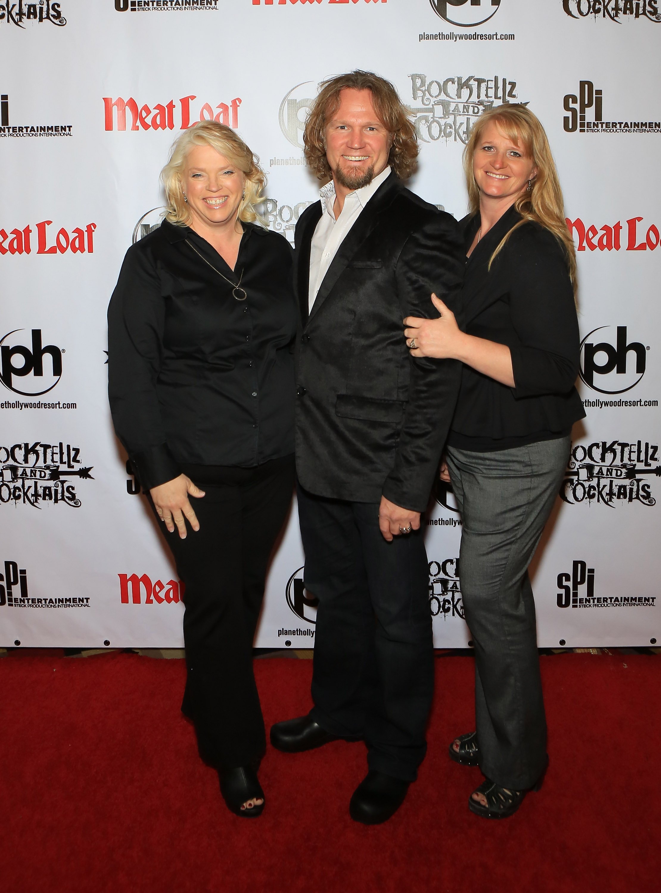 Janelle Brown, Kody Brown and Christine Brown from "Sister Wives" arrive at the show "RockTellz & CockTails presents Meat Loaf" at Planet Hollywood Resort & Casino on October 3, 2013 in Las Vegas, Nevada | Source: Getty Images 
