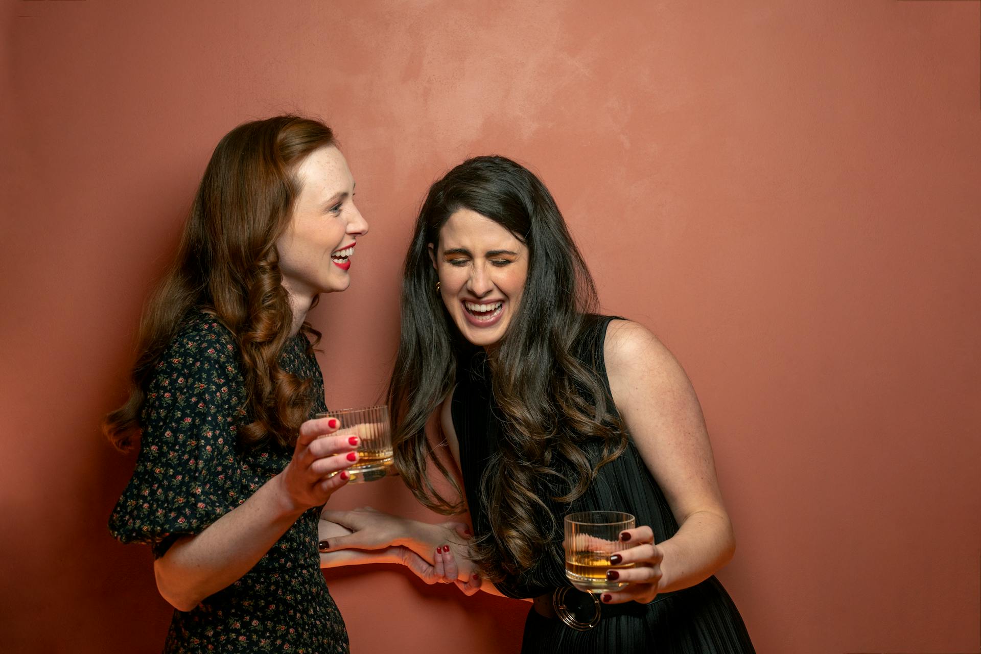 Two women laughing together | Source: Pexels