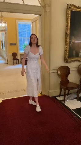 A video still shared on 2 August 2023 captured historian Alice Loxton walking through the grand entrance hall of 10 Downing Street, offering a rare glimpse inside the historic residence — a setting now back in the spotlight amid scrutiny over Keir Starmer's reported refurbishment of the adjoining No. 11 flat. | Source: YouTube/Alice Loxton