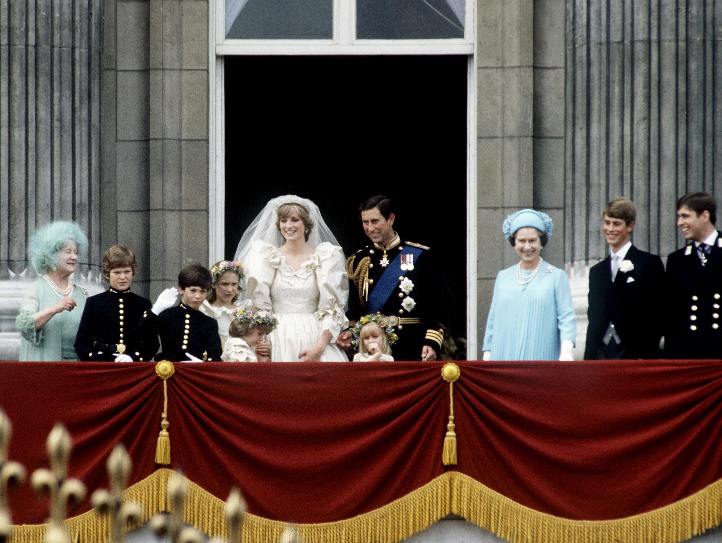 Prince Charles And Princess Diana With Their Bridesmaids And Pageboys, The Queen Mother, The Queen, Prince Edward And Prince Andrew On The Balcony Of Buckingham Palace On Their Wedding Day In London on 29th July 1981 | Source: Getty Images