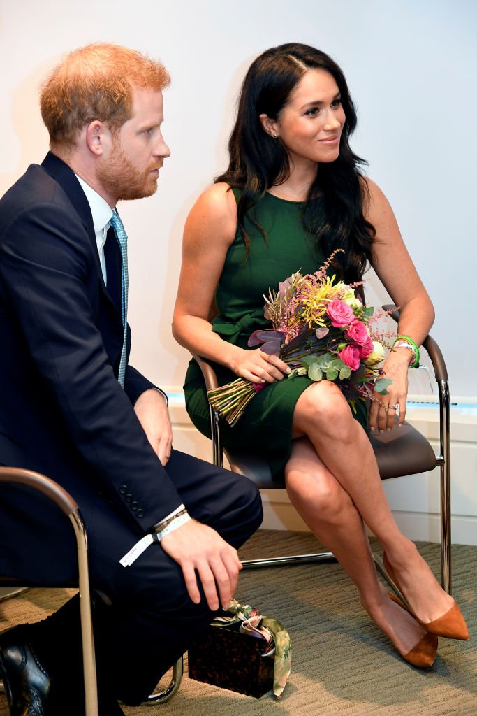 Prince Harry alongside his wife Meghan Markle | Photo: Getty Images