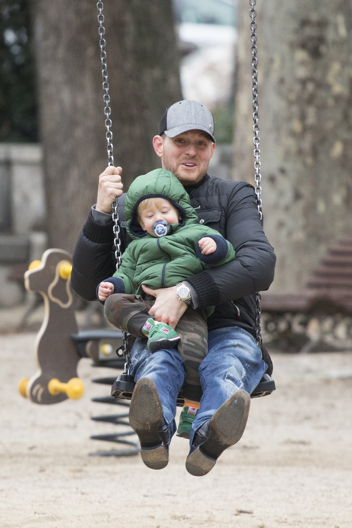 Michael Buble bonding with his son Noah at a playground on February 12, 2015, in Madrid, Spain. | Source: Iconic/GC Images/Getty Images