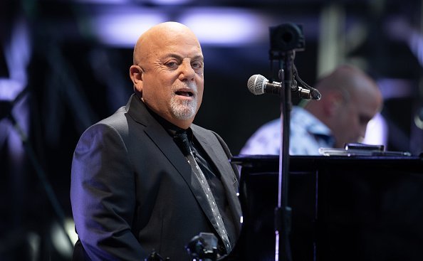 Billy Joel performing at his only concert in Germany. | Photo: Getty Images