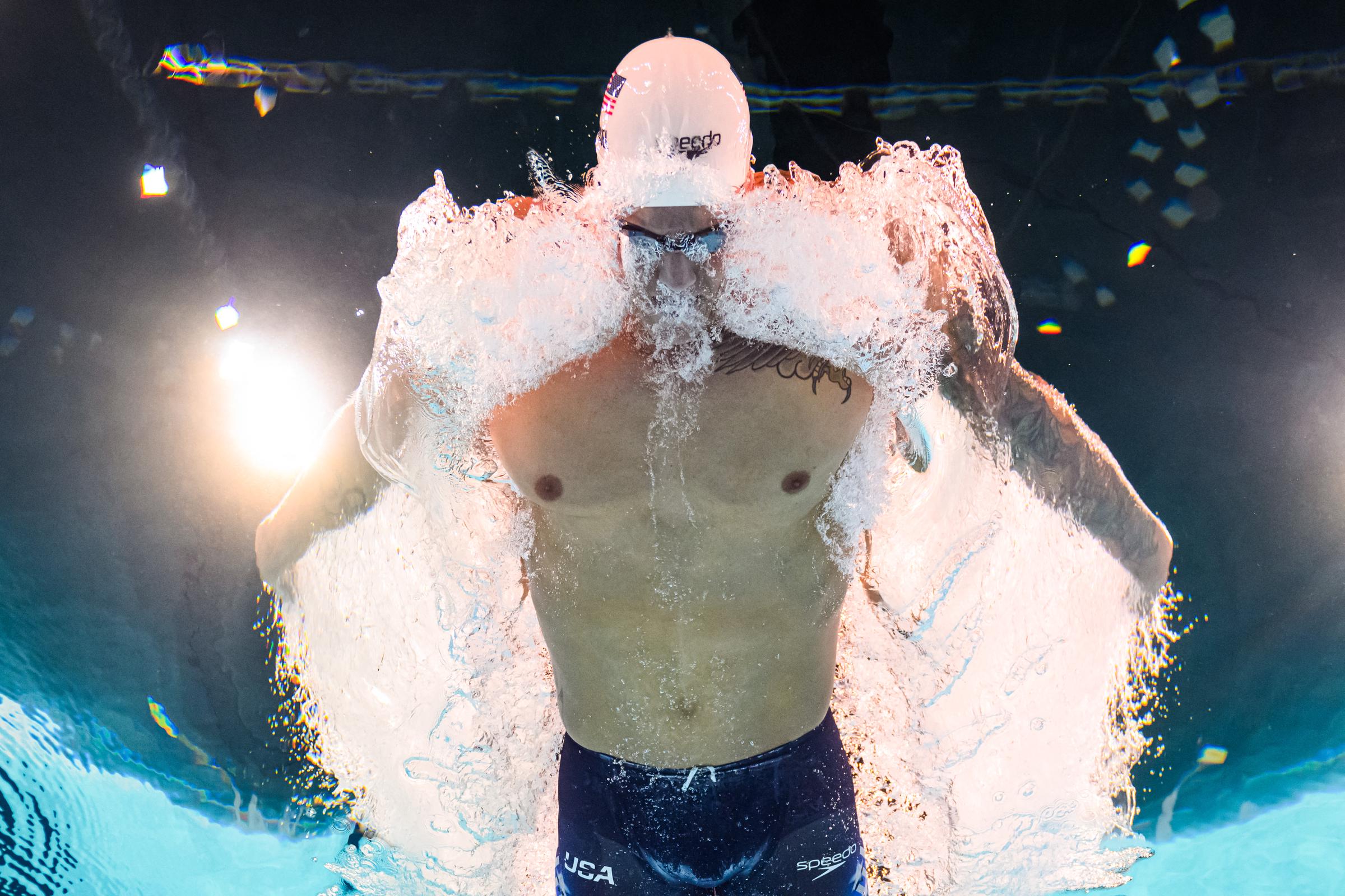 An underwater view shows Caeleb Dressel as he competes at the Olympic Games Paris 2024 on August 2, 2024 | Source: Getty Images