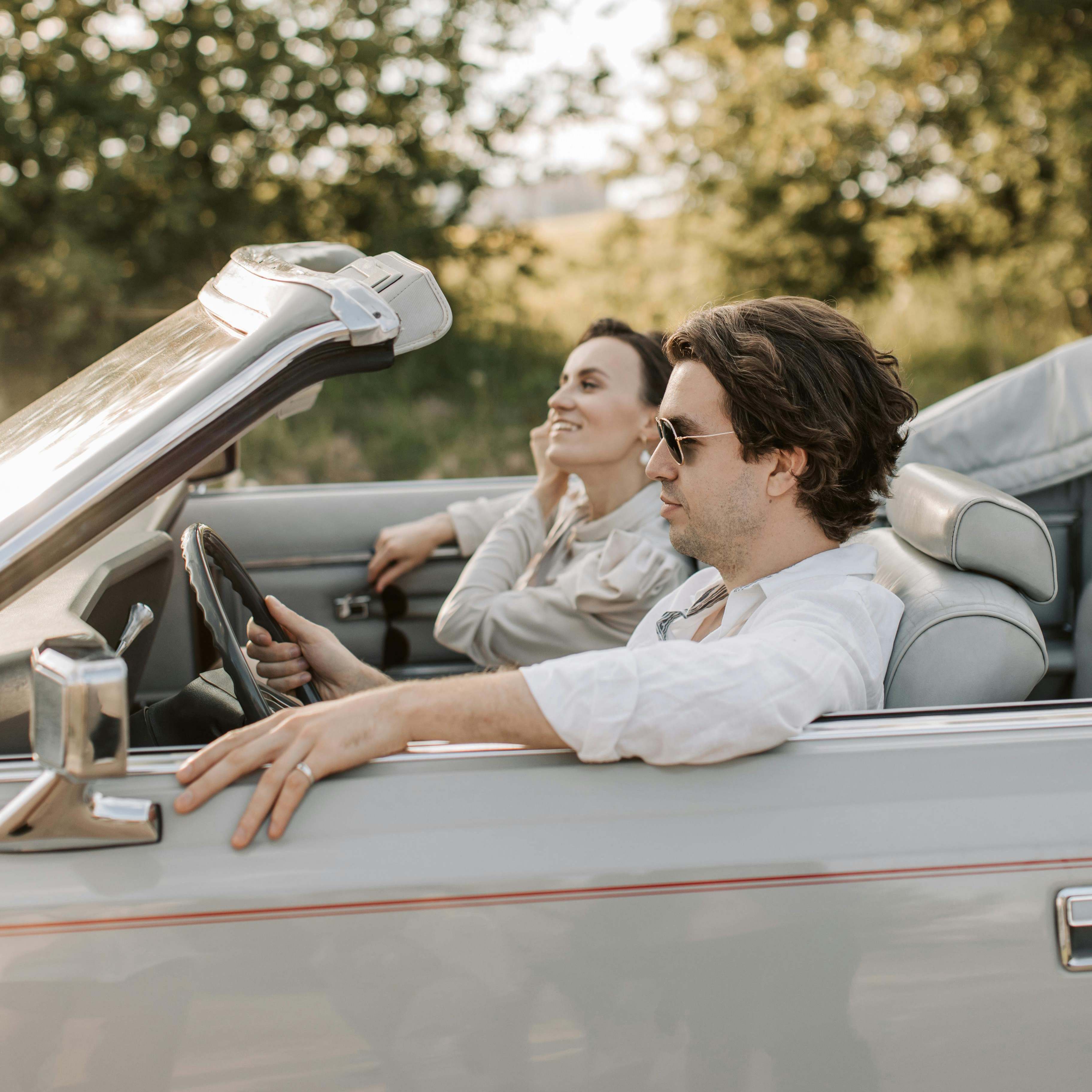 A couple driving through the countryside | Source: Pexels