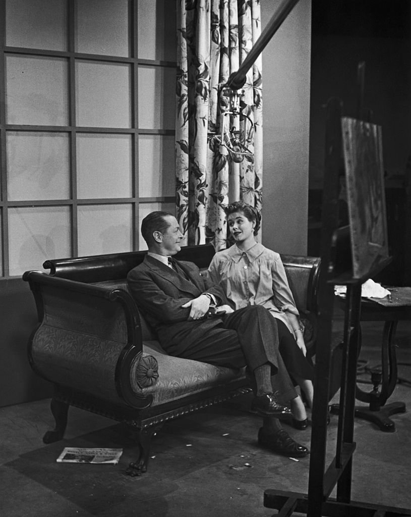 Producer Robert Montgomery on a film set with his daughter, singer Elizabeth Montgomery in 1955 | Photo: Getty Images