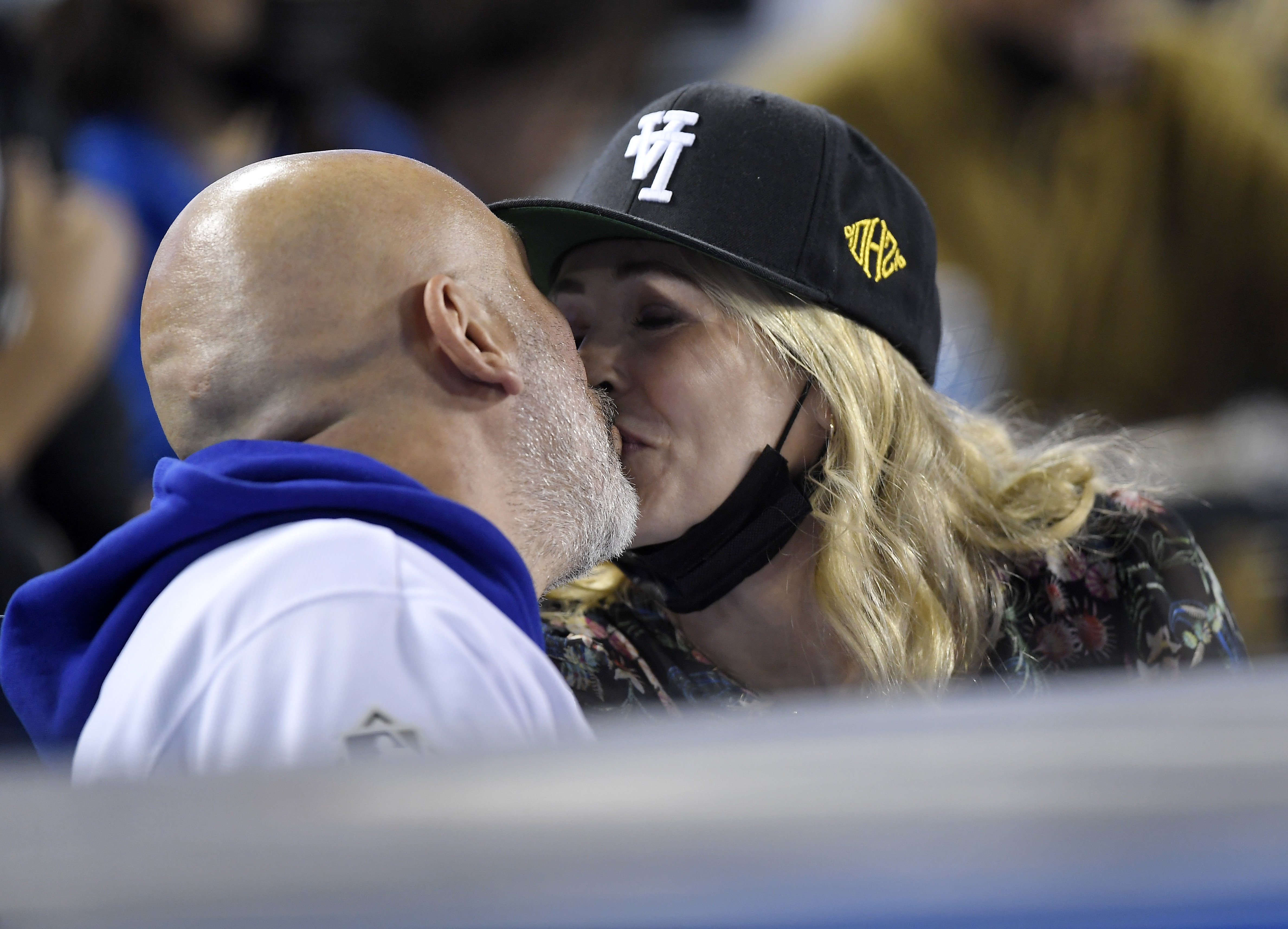 Chelsea Handler and Jo Koy at the game between the San Diego Padres and the Los Angeles Dodgers at Dodger Stadium, 2021 | Photo: Getty Images 