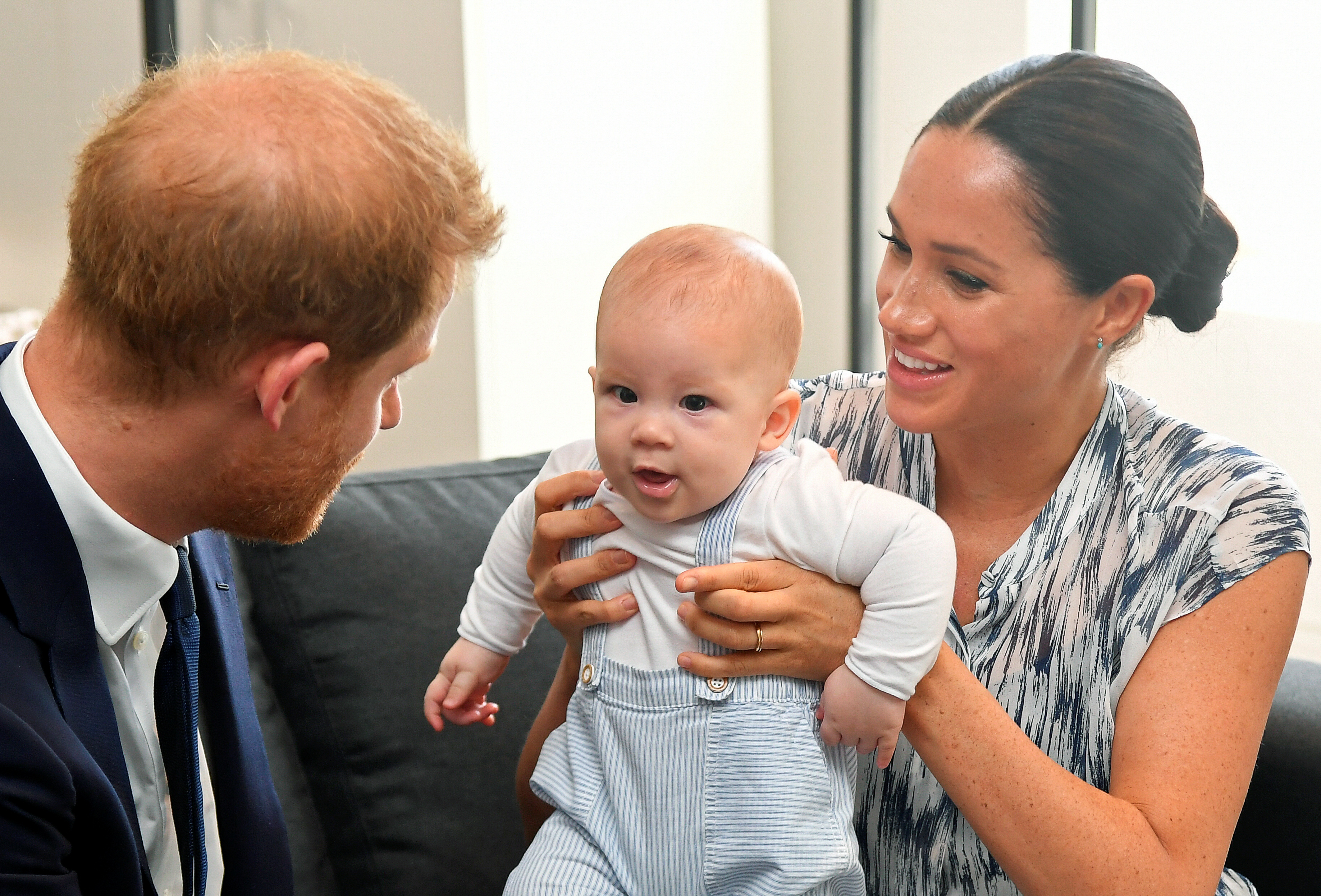 Prince Harry looks at Archie as his wife Meghan Markle holds their son at the Desmond & Leah Tutu Legacy Foundation, on September 25, 2019, in Cape Town, South Africa. | Source: Getty Images