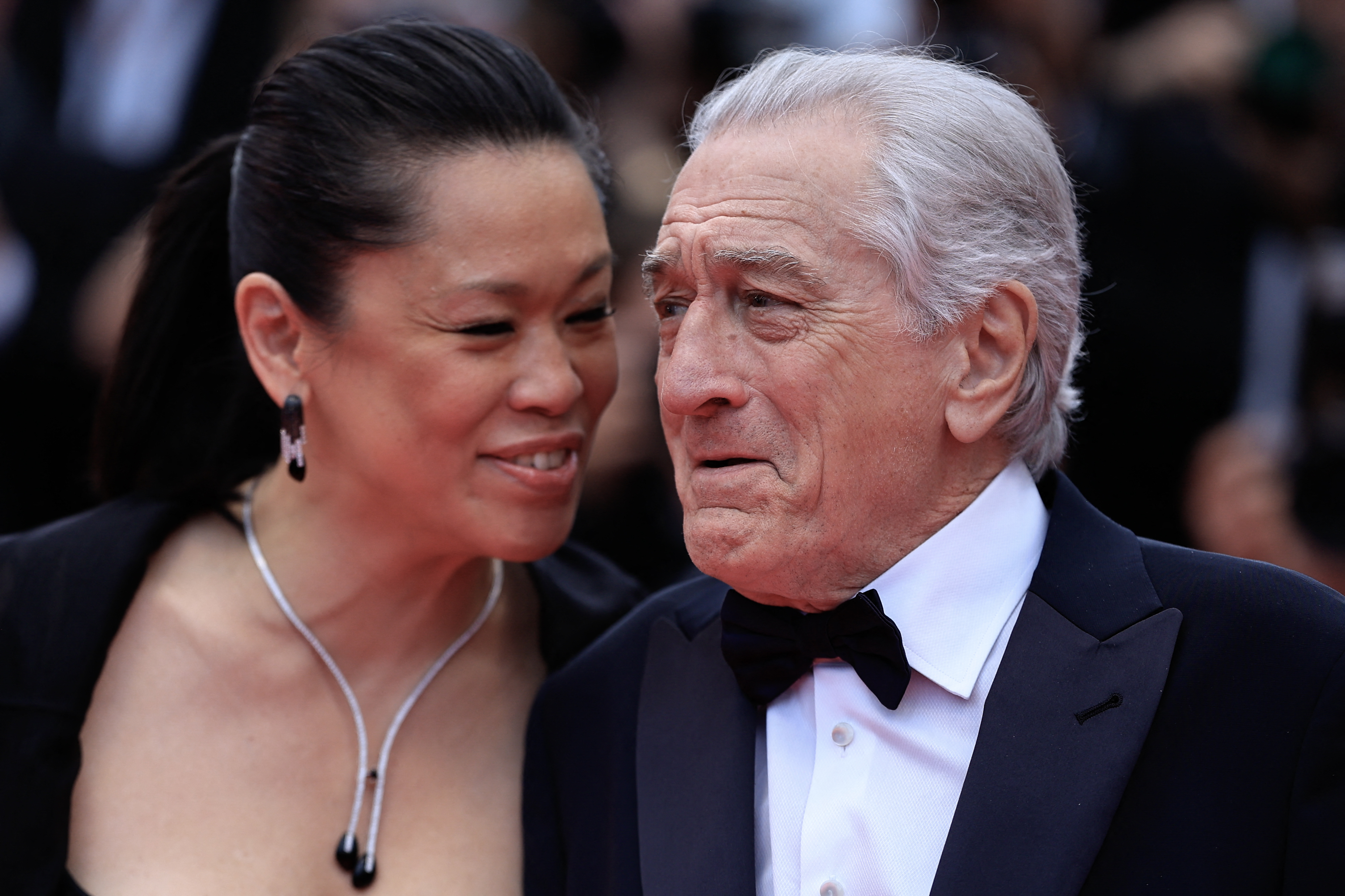 Robert De Niro and Tiffany Chen attend the red carpet at the 78th annual Cannes Film Festival at Palais des Festivals on May 13, 2025, in France | Source: Getty Images