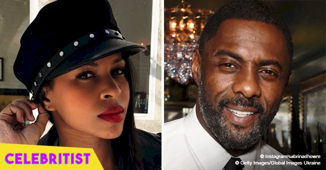 Idris Elba can't take his eyes off of fiancée Sabrina who stuns in tight black dress in pic