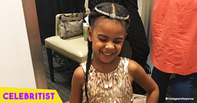 Blue Ivy steals the show by teaching her friend to throw up the roc to Jay-Z in new video