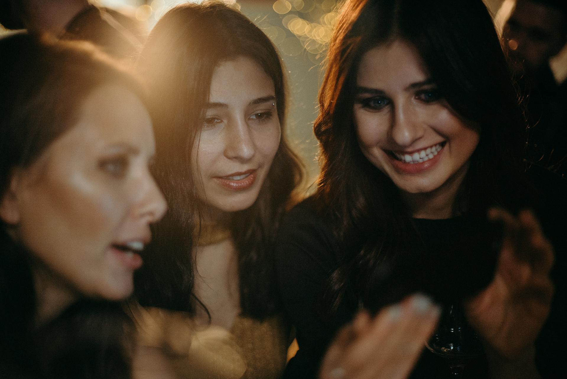 People chatting at a party | Source: Pexels