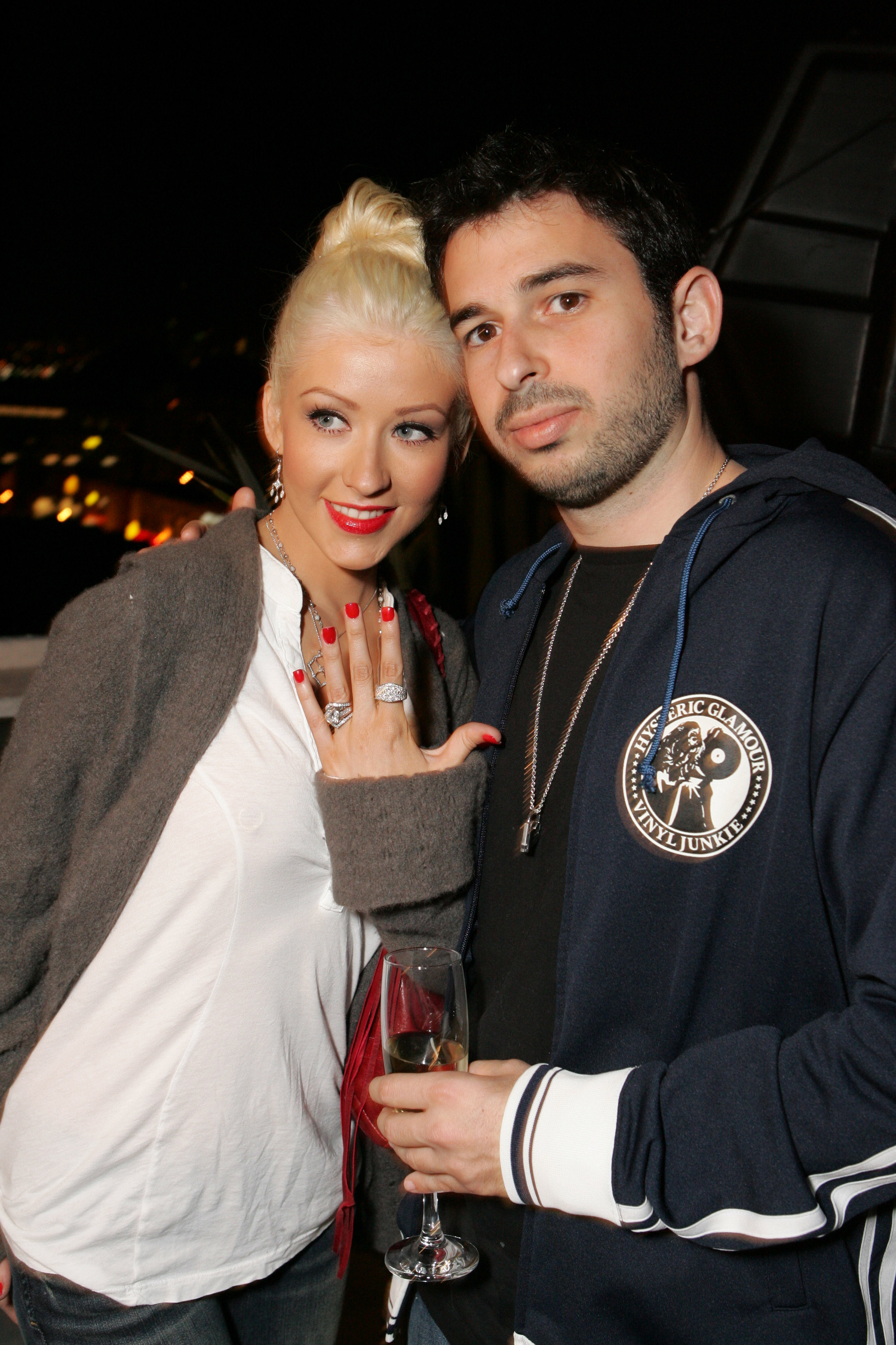 Christina Aguilera and Jordan Bratman during Veuve Clicquot Vintage 1998 Sponsors the US Launch of Stephen Webster's "Femme Fatale" Diamond Collection at Chateau Marmont on December 9, 2005 in Hollywood, California. | Source: Getty Images