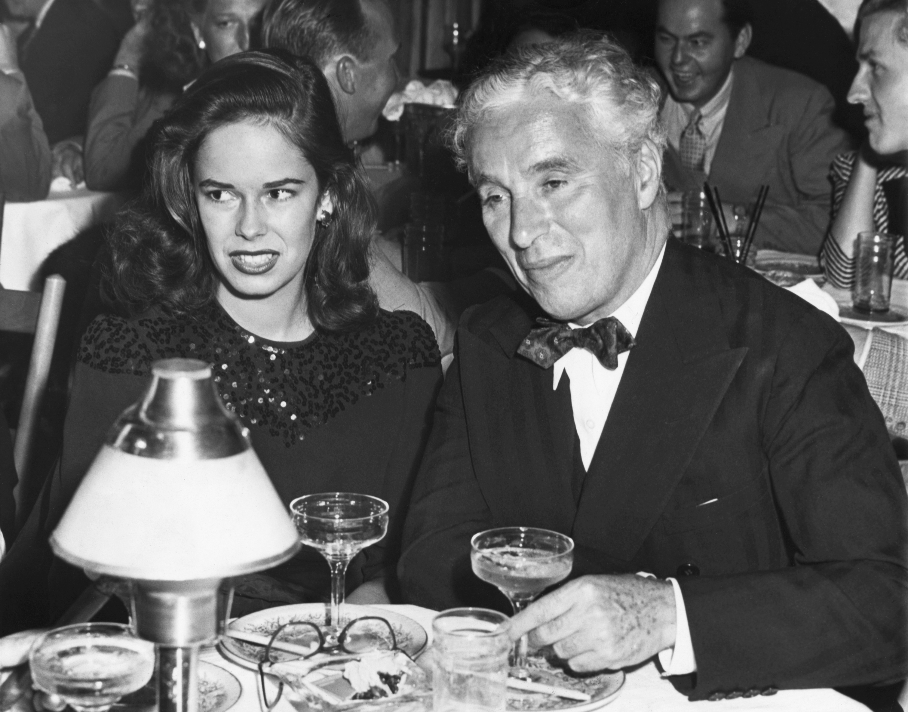 Charlie Chaplin and his then new bride, 18-year-old Oona, making their first public appearance at the nightclub Mocambo on July 3, 1943 | Source: Getty Images